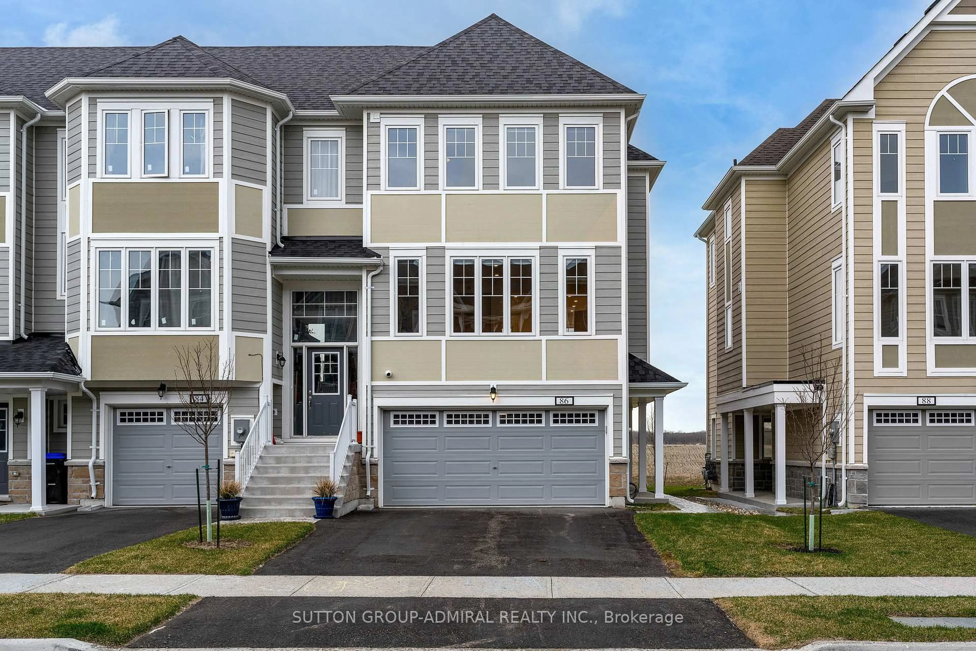 Home with vinyl exterior material, street for 86 Sandhill Crane Dr, Wasaga Beach Ontario L9Z 0K4