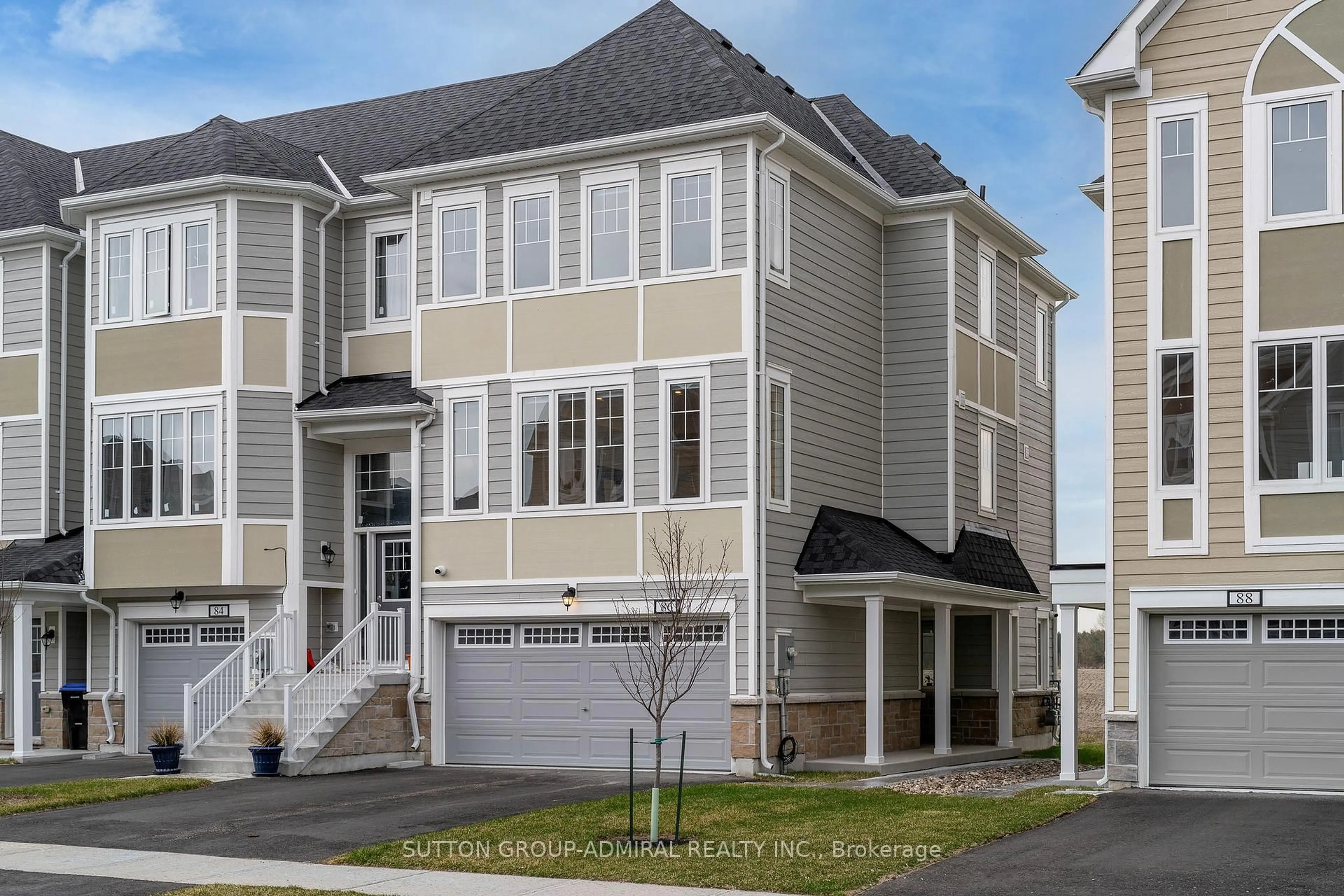 Home with vinyl exterior material, street for 86 Sandhill Crane Dr, Wasaga Beach Ontario L9Z 0K4