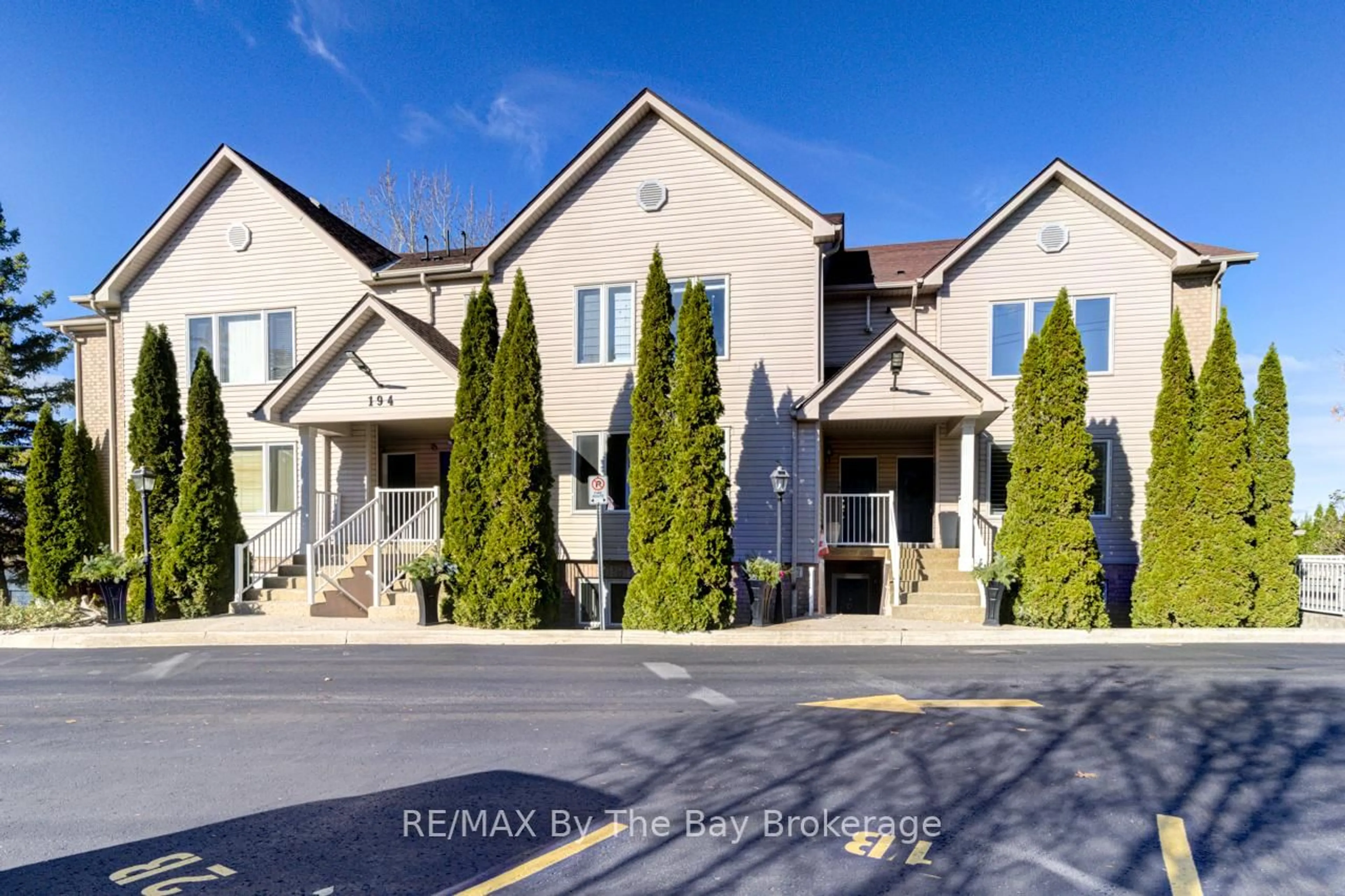 Home with brick exterior material, street for 194 RIVER Rd #2C, Wasaga Beach Ontario L9Z 2L6