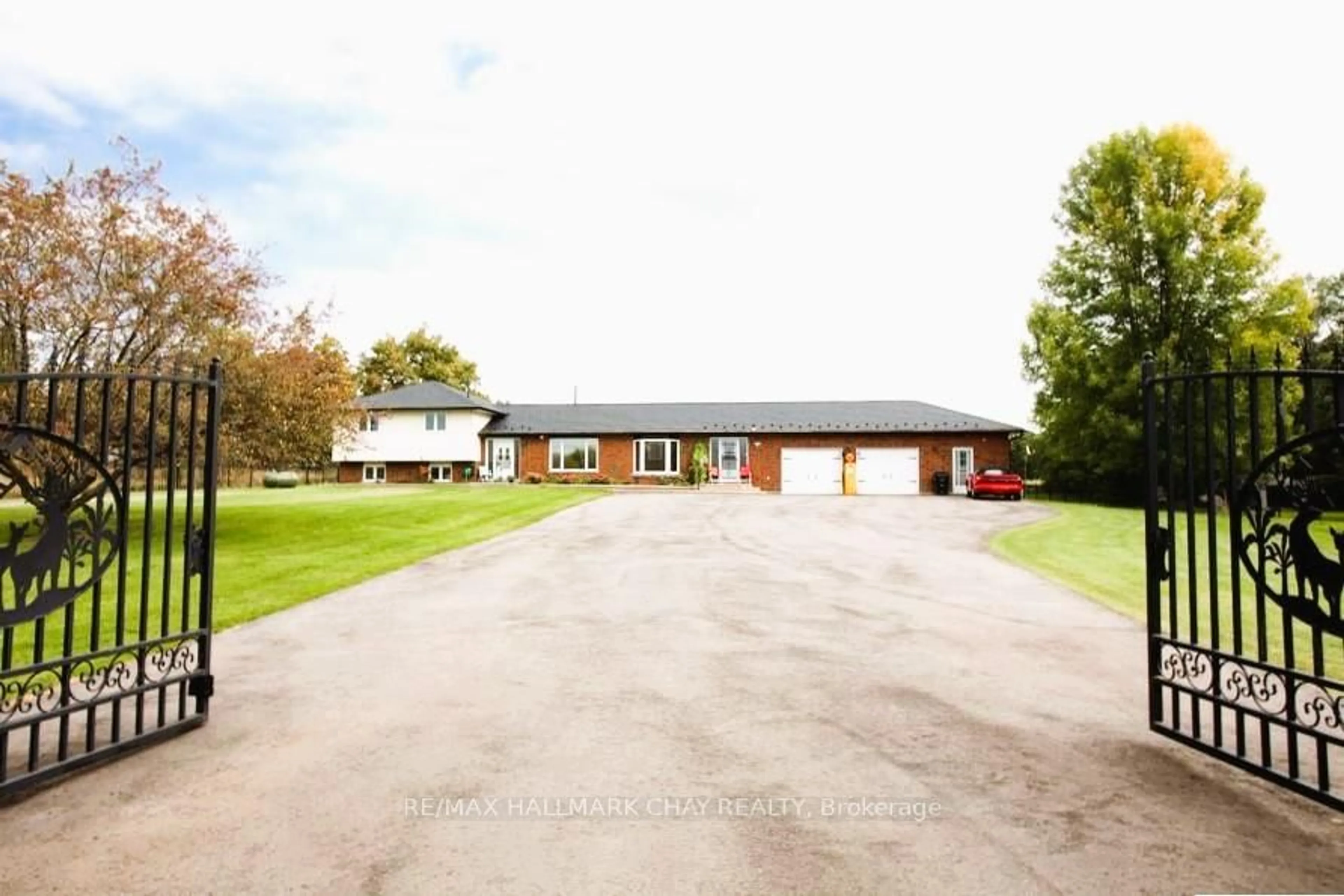 A pic from outside/outdoor area/front of a property/back of a property/a pic from drone, street for 6689 Rama Rd, Ramara Ontario L0K 1L0