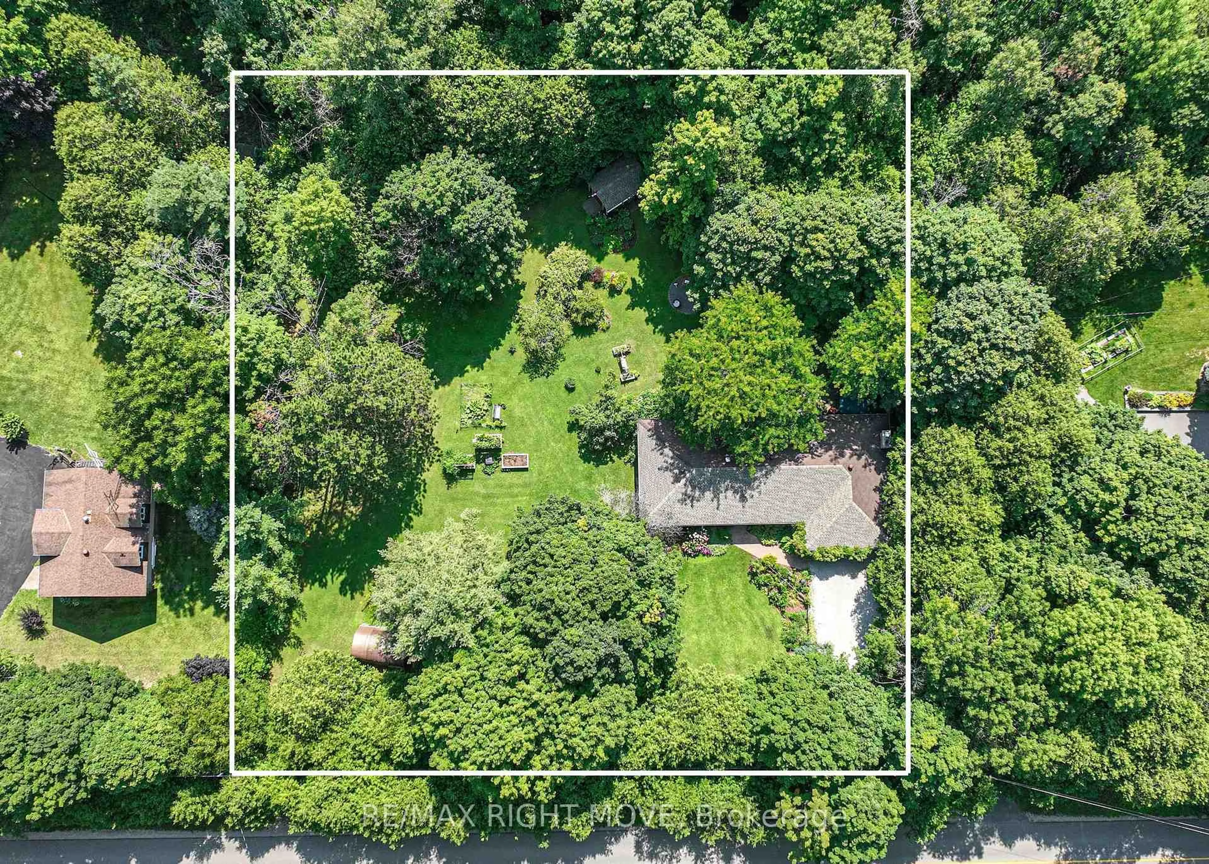 A pic from outside/outdoor area/front of a property/back of a property/a pic from drone, forest/trees view for 1613 Mt. St. Louis Rd, Oro-Medonte Ontario L0K 1E0