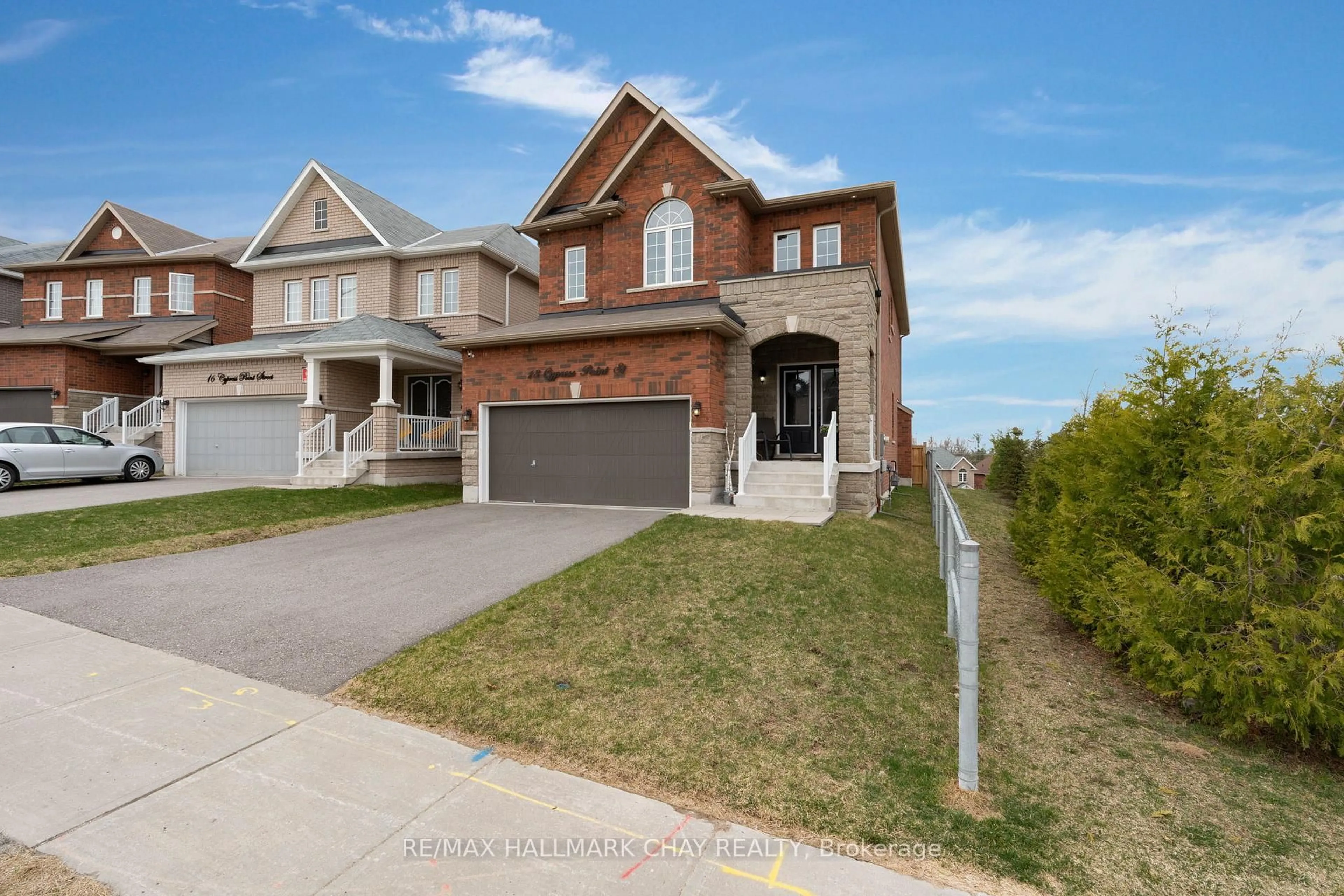 Home with brick exterior material, street for 18 Cypress Point St, Barrie Ontario L4N 6J9
