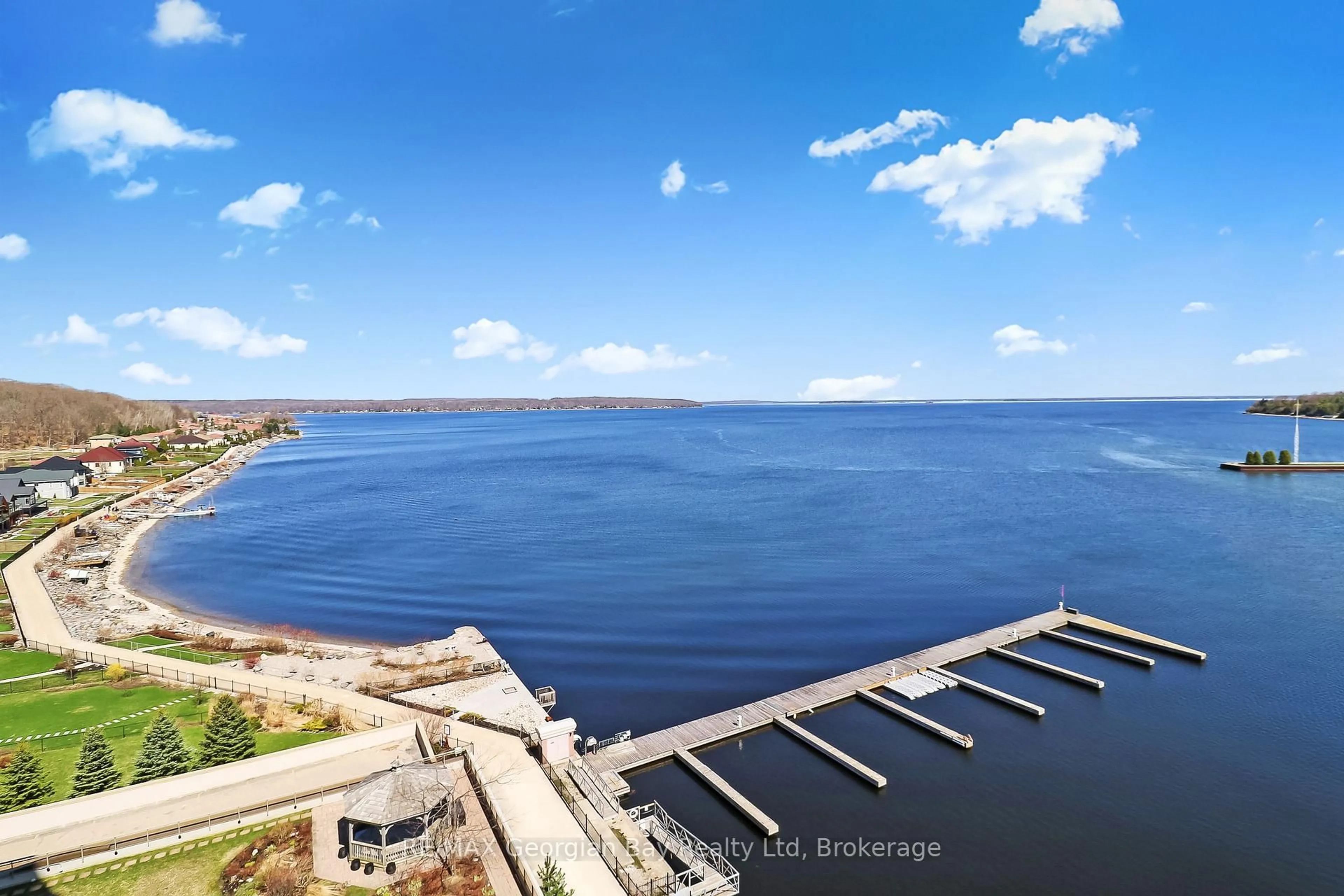 A pic from outside/outdoor area/front of a property/back of a property/a pic from drone, water/lake/river/ocean view for 699 Aberdeen Blvd #905, Midland Ontario L4R 5P2
