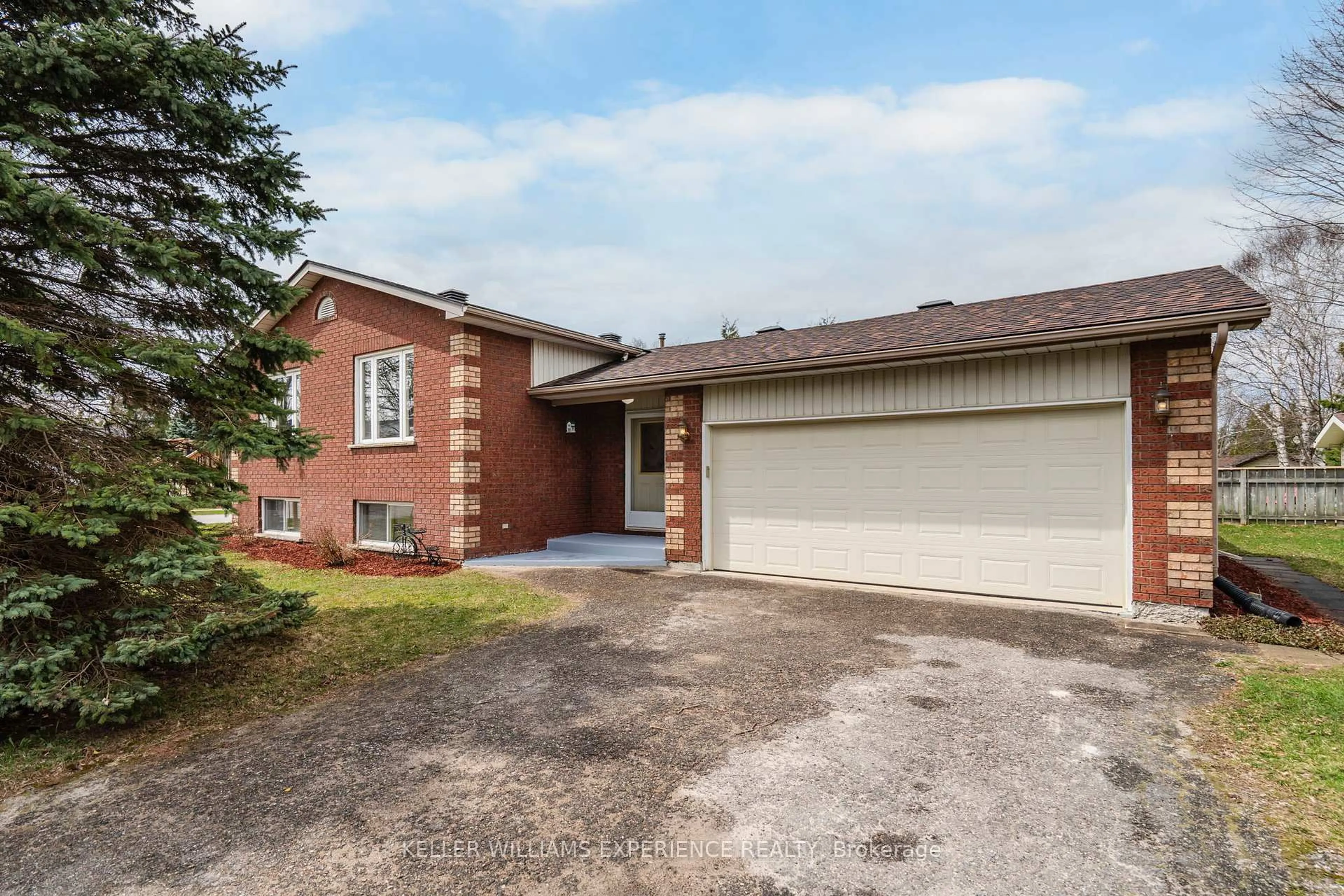 Home with brick exterior material, street for 14 Glenview Ave, Springwater Ontario L0L 1P0
