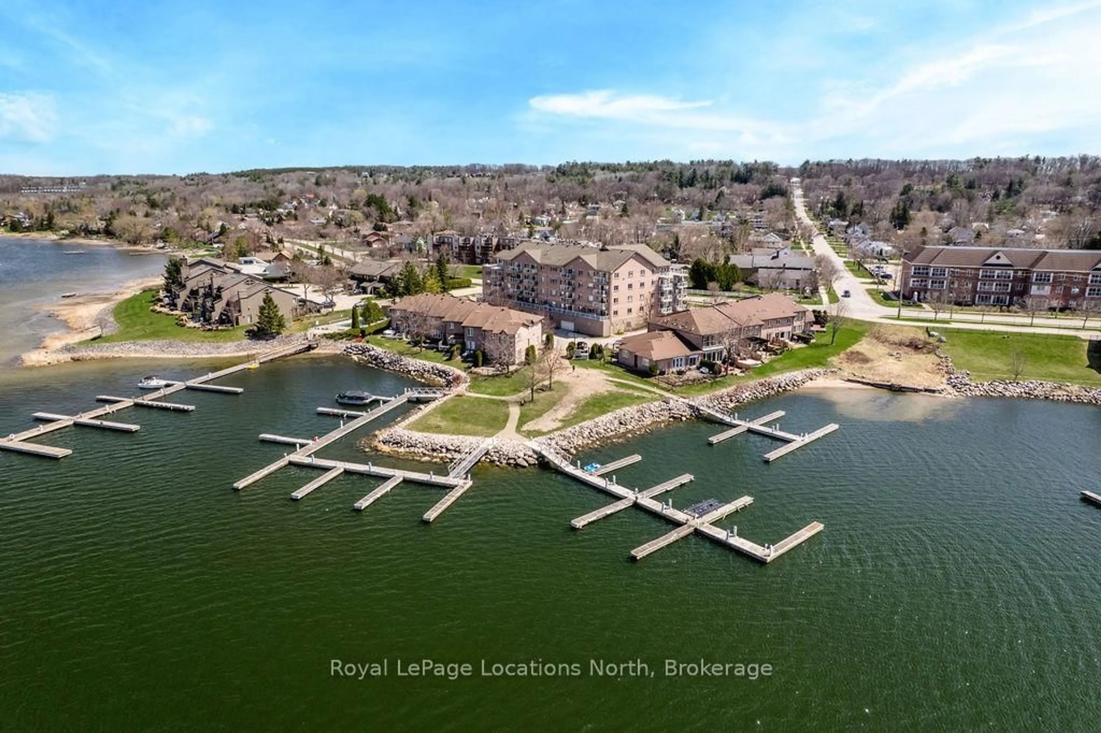 A pic from outside/outdoor area/front of a property/back of a property/a pic from drone, water/lake/river/ocean view for 4 BECK Blvd #6, Penetanguishene Ontario L9M 2H3