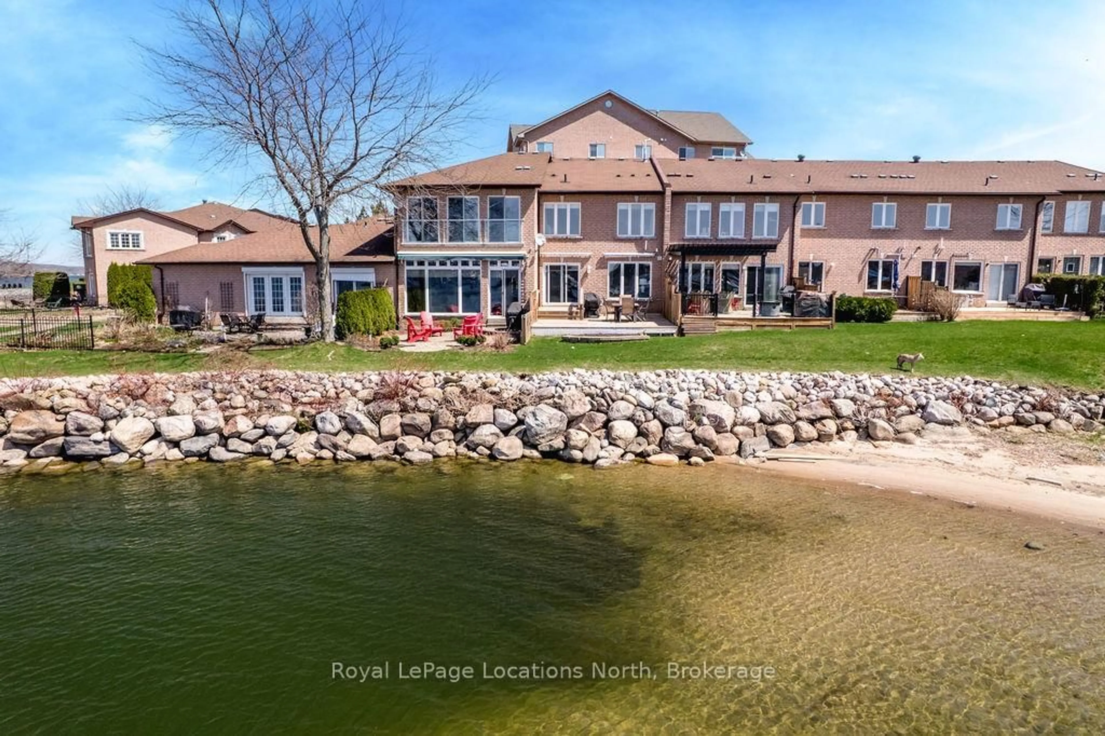 A pic from outside/outdoor area/front of a property/back of a property/a pic from drone, water/lake/river/ocean view for 4 BECK Blvd #6, Penetanguishene Ontario L9M 2H3