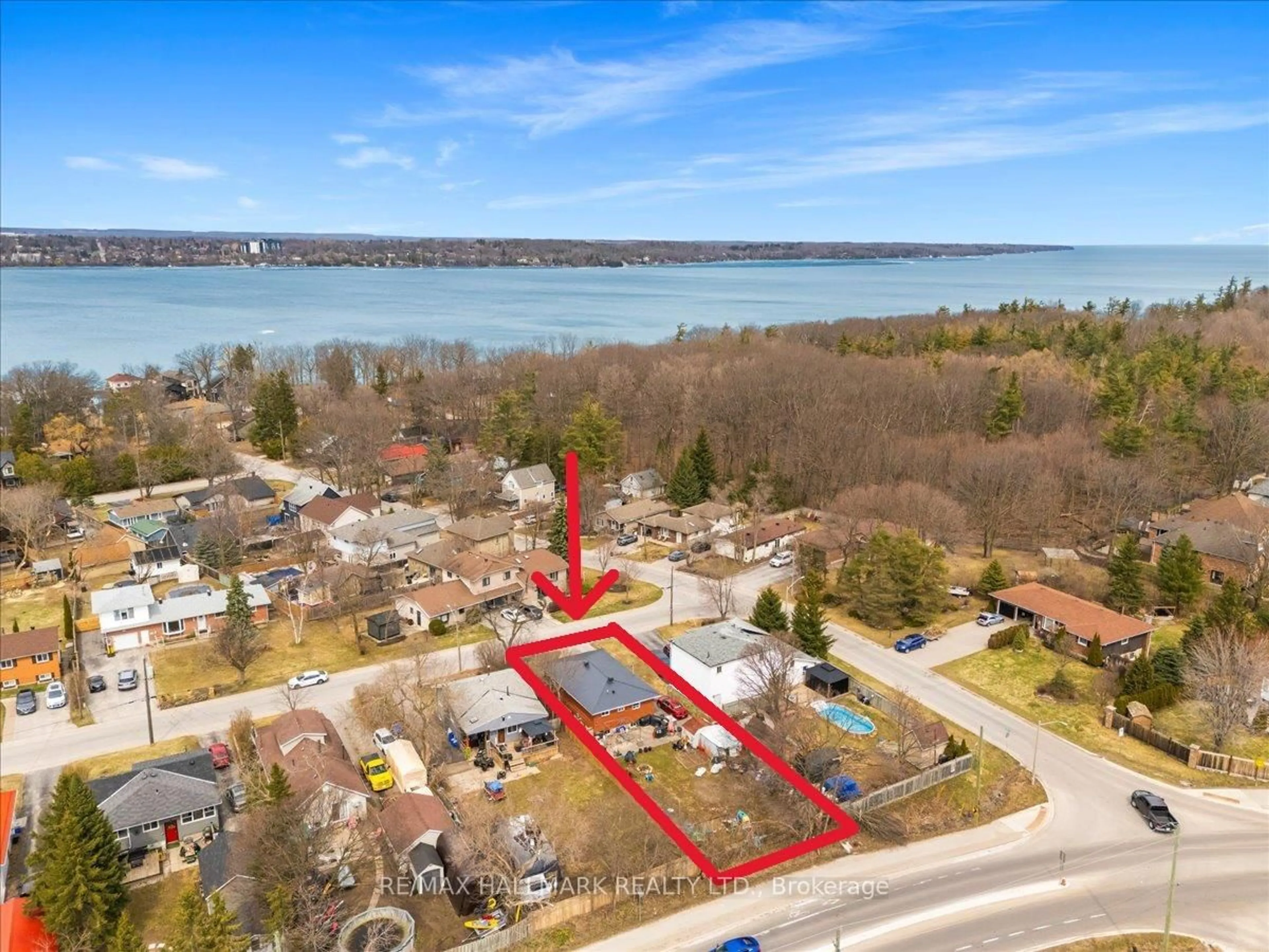 A pic from outside/outdoor area/front of a property/back of a property/a pic from drone, water/lake/river/ocean view for 227 Southview Rd, Barrie Ontario L4N 3X6
