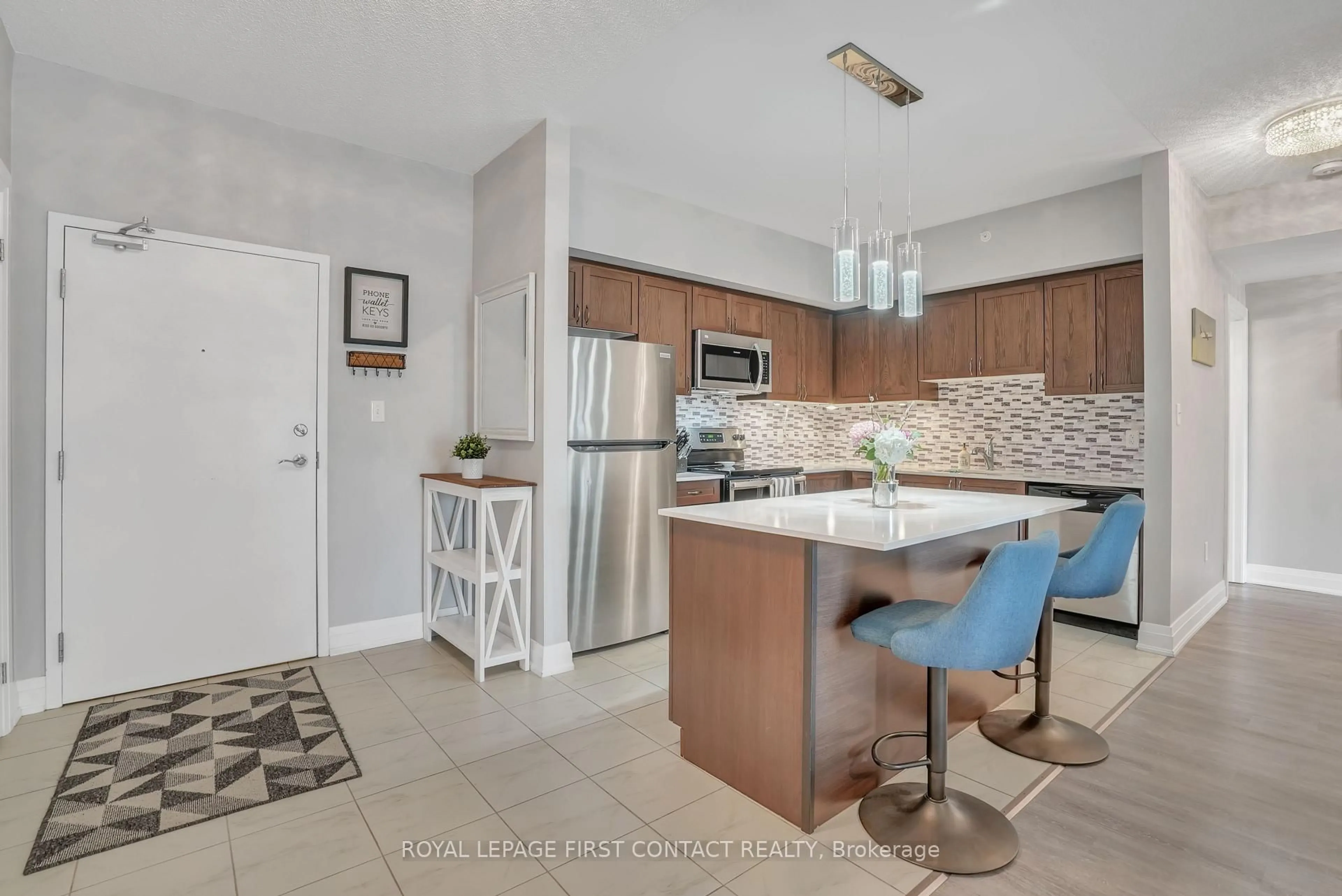 Open concept kitchen, ceramic/tile floor for 306 Essa Rd #305, Barrie Ontario L9J 0H5