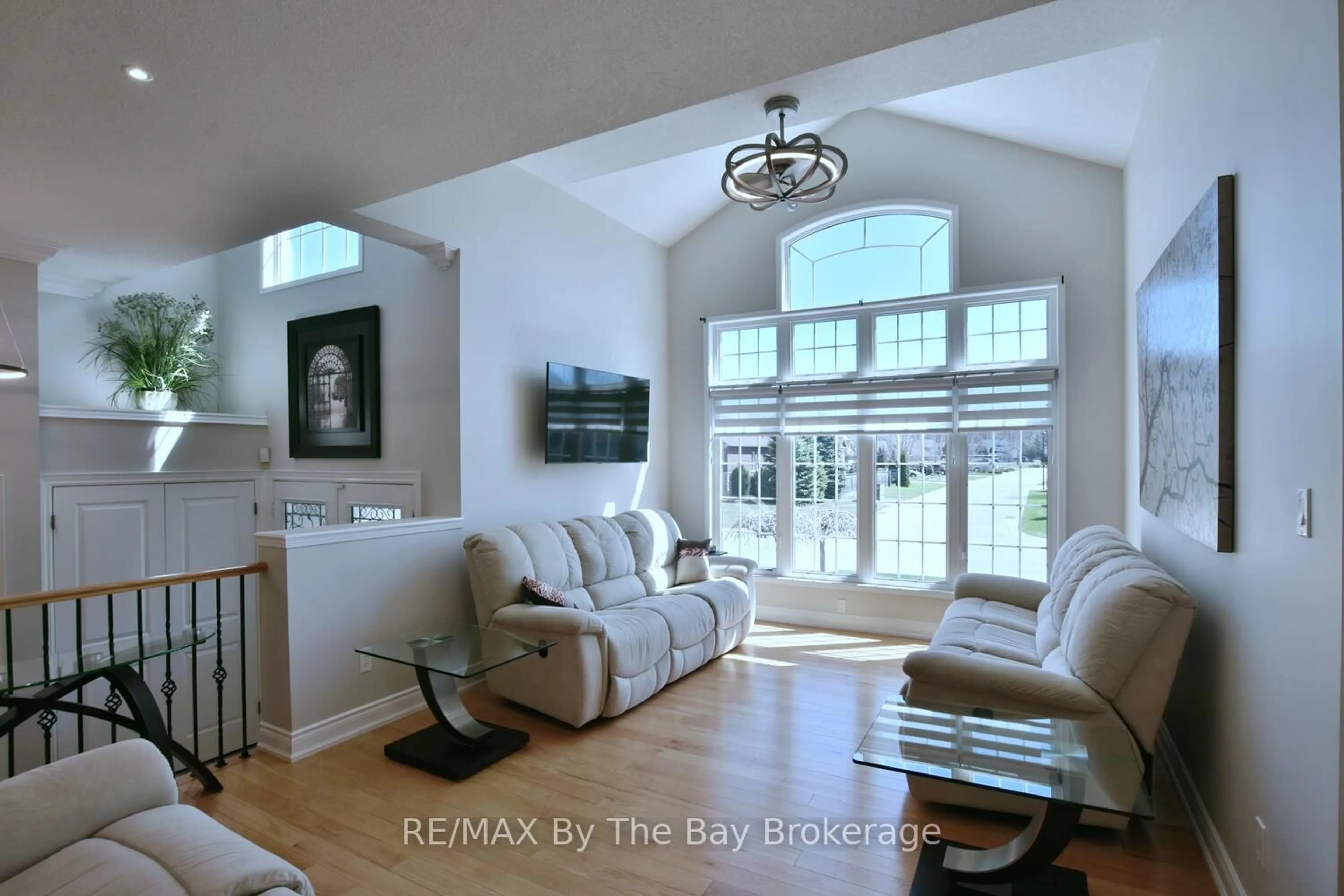 Living room with furniture, ceramic/tile floor for 108 Royal Beech Dr, Wasaga Beach Ontario L9Z 1M5