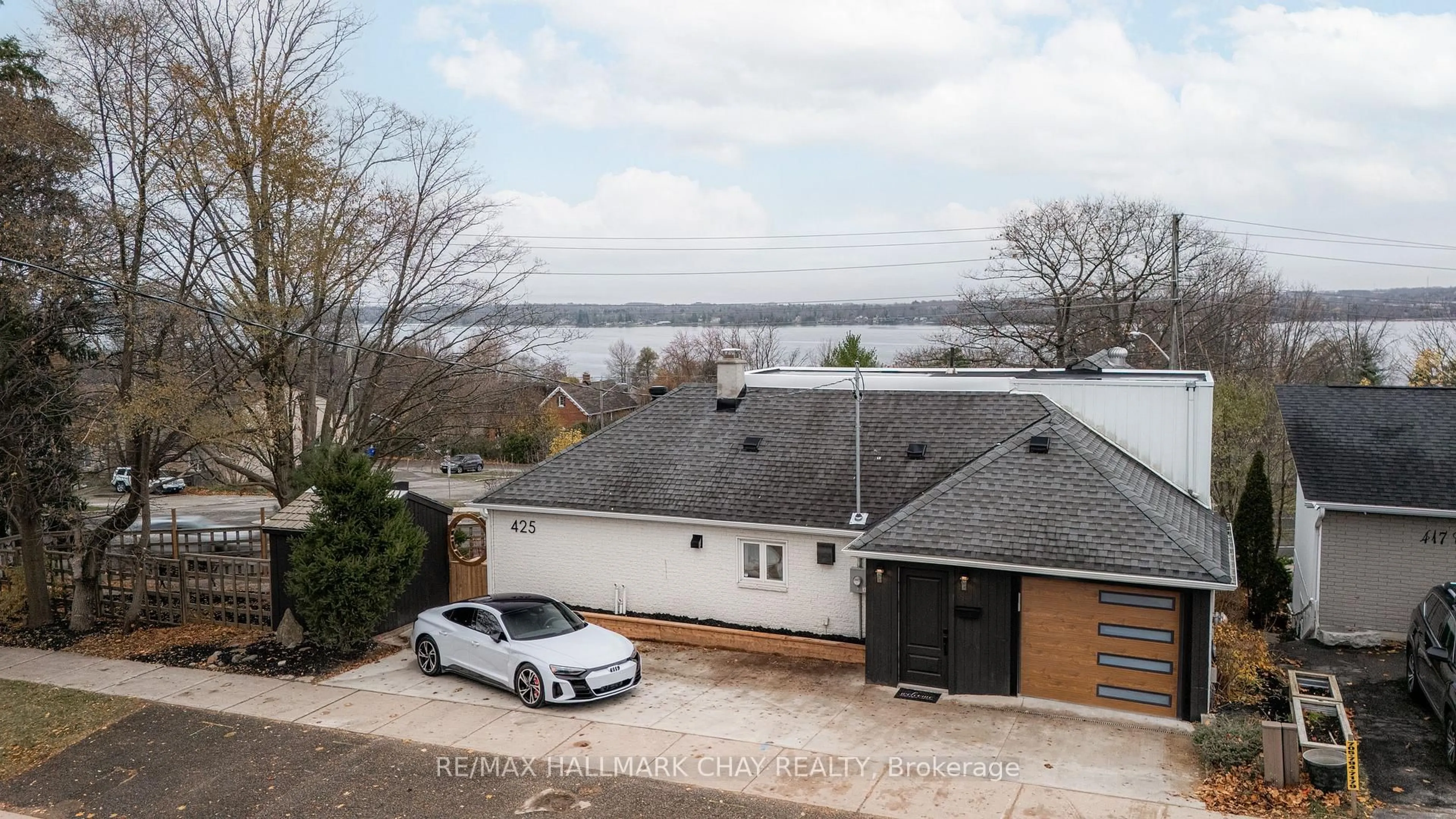 A pic from outside/outdoor area/front of a property/back of a property/a pic from drone, water/lake/river/ocean view for 425 Codrington St, Barrie Ontario L4M 1S9