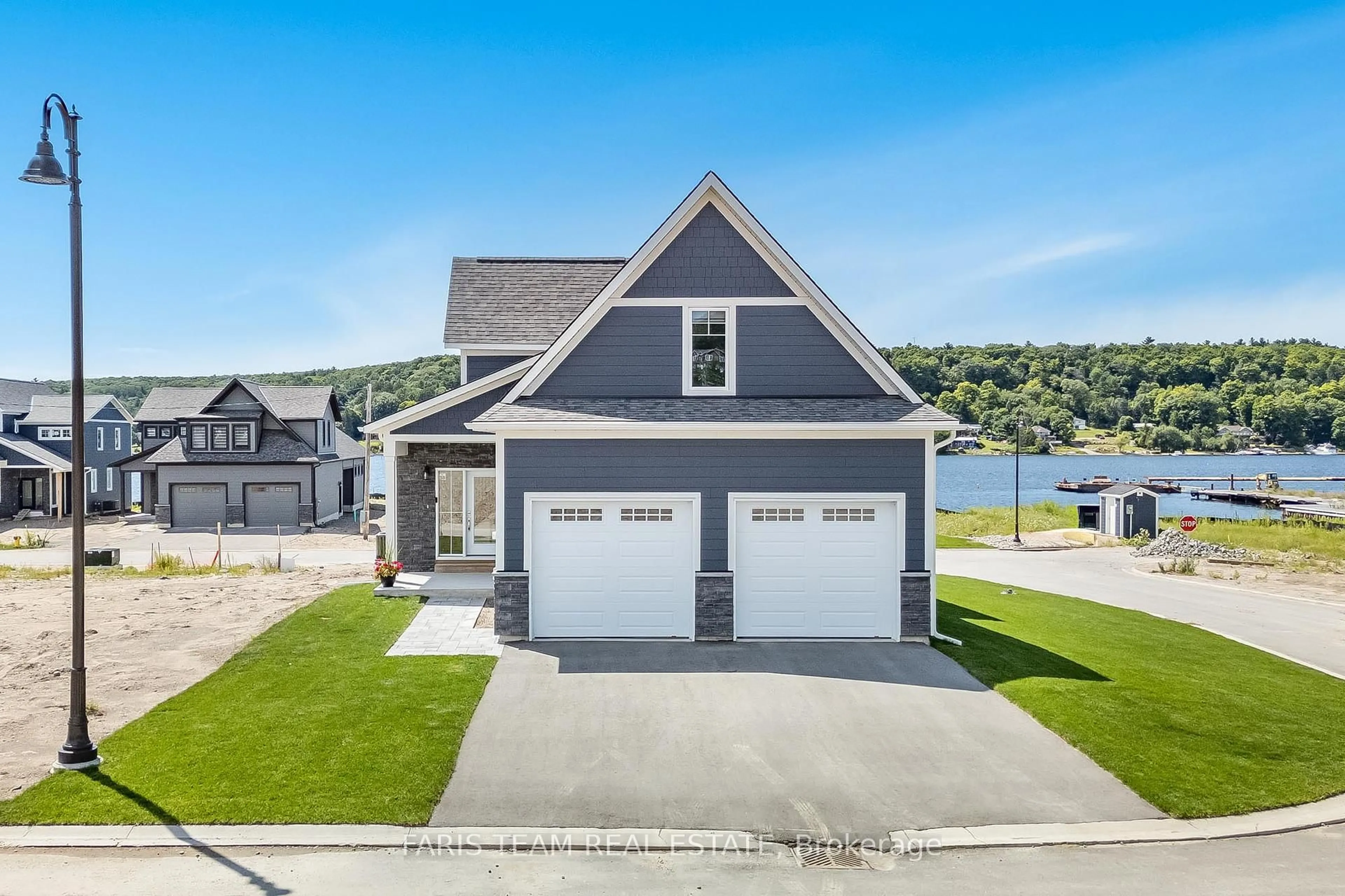 Home with vinyl exterior material, water/lake/river/ocean view for 38 Magazine St, Penetanguishene Ontario L9M 0W7