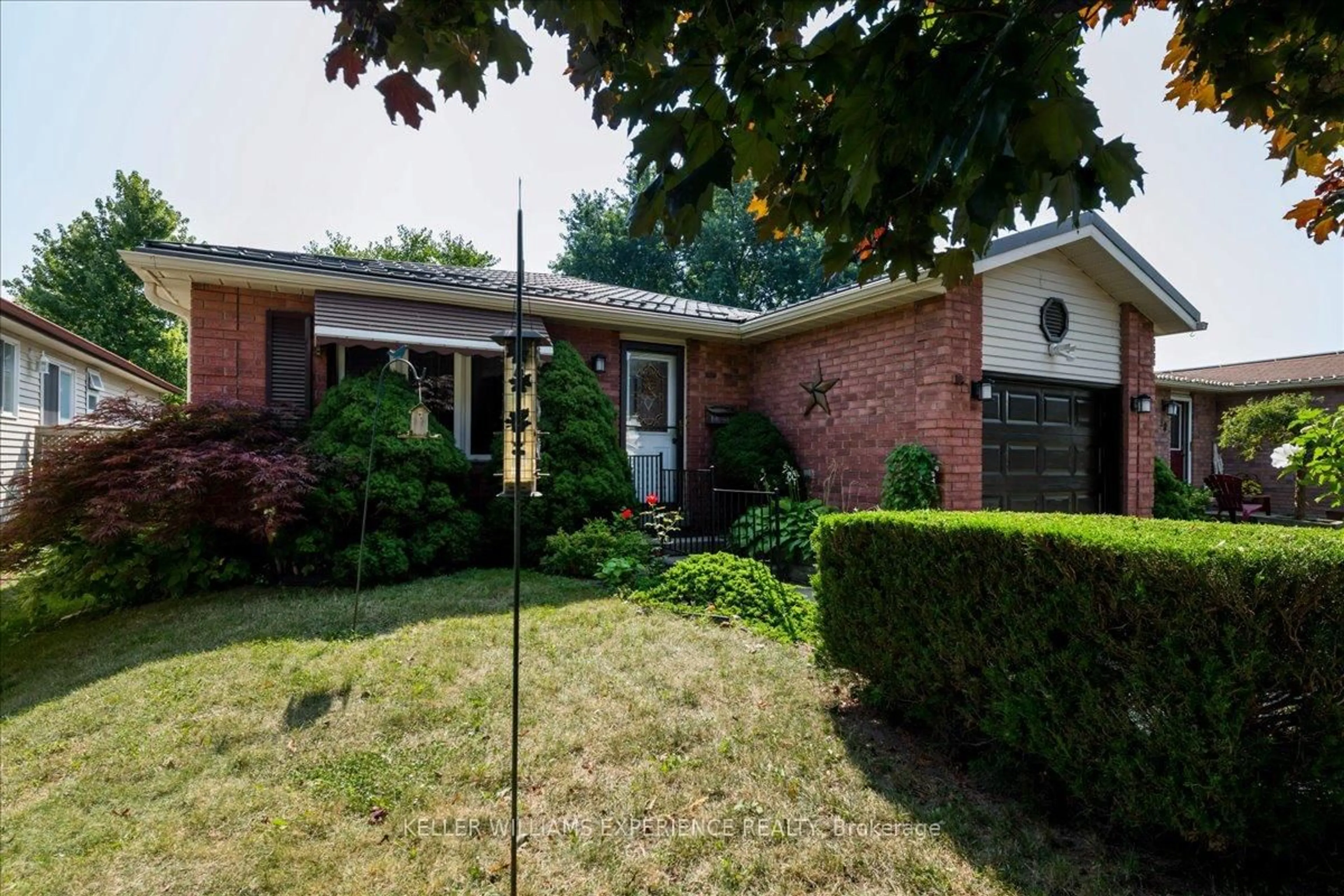 Home with brick exterior material, street for 92 Hickling Tr, Barrie Ontario L4M 5T3