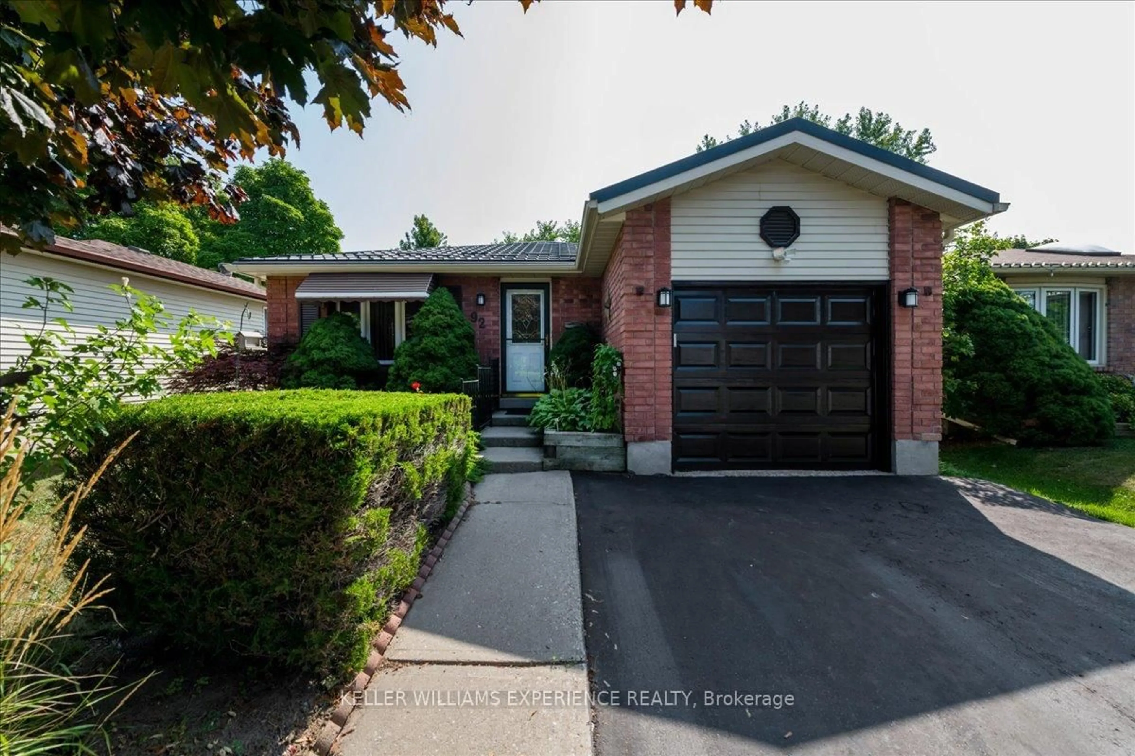 Home with brick exterior material, street for 92 Hickling Tr, Barrie Ontario L4M 5T3