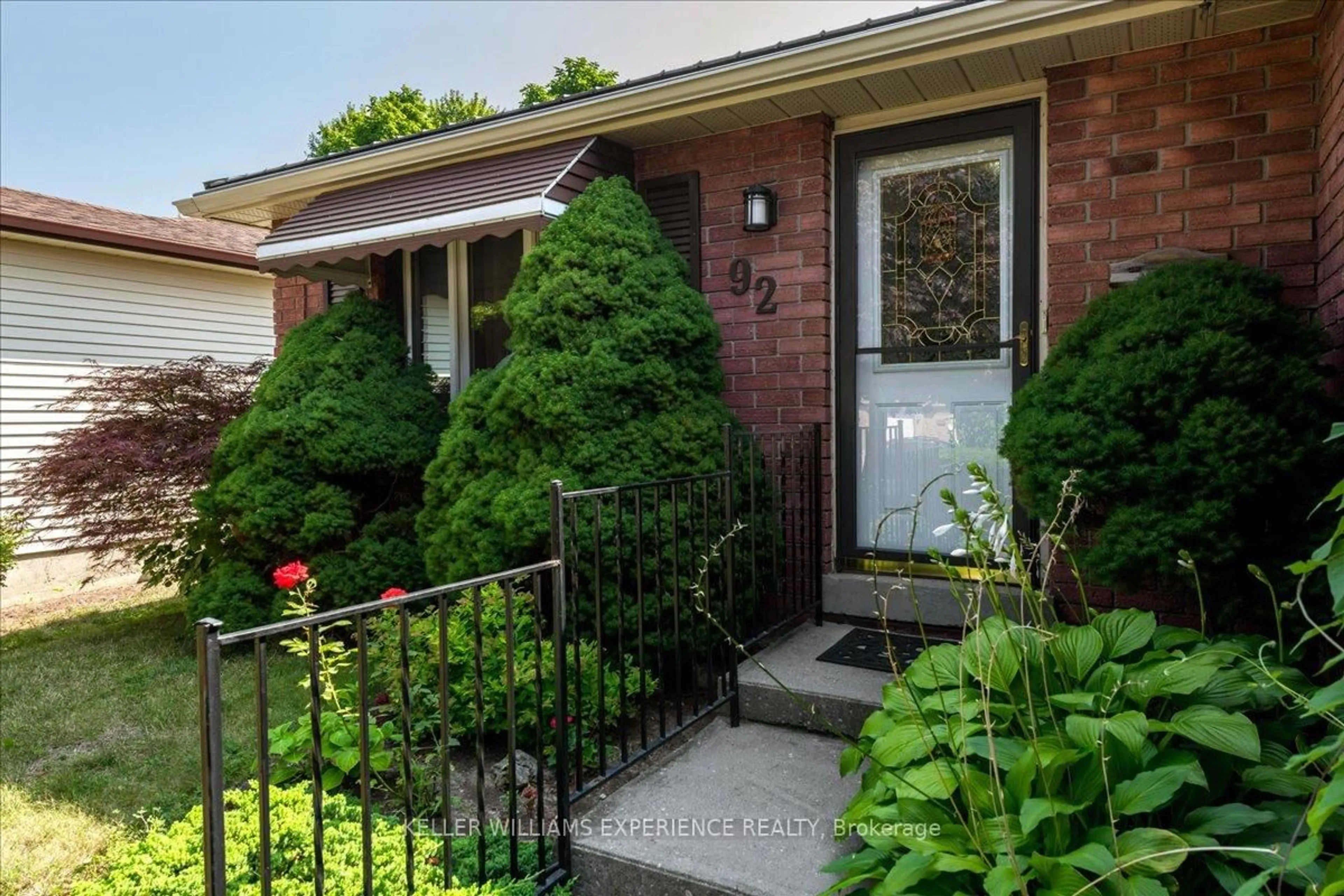 Home with brick exterior material, street for 92 Hickling Tr, Barrie Ontario L4M 5T3