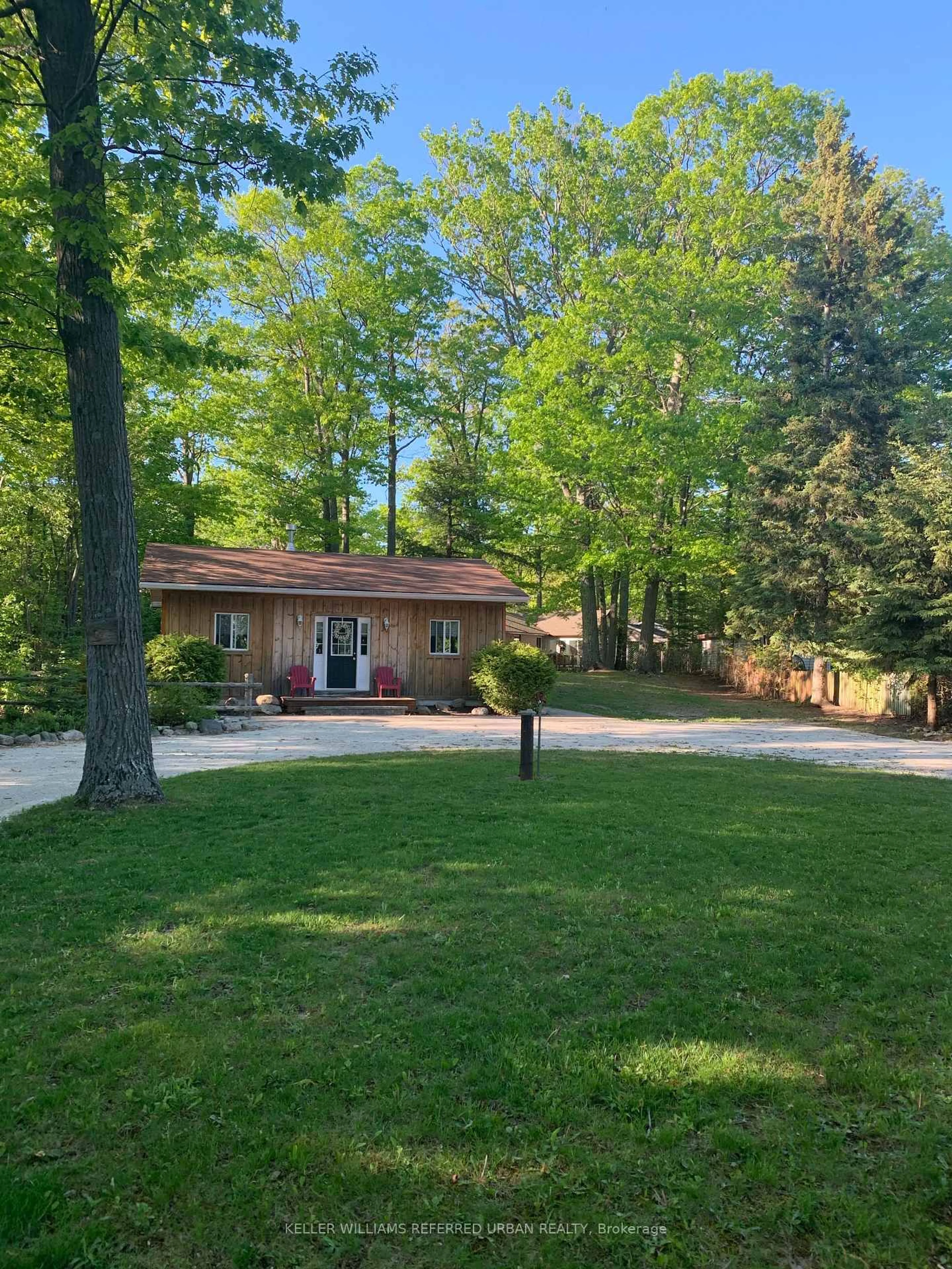 A pic from outside/outdoor area/front of a property/back of a property/a pic from drone, street for 1833 Tiny Beaches Rd, Tiny Ontario L0L 1P1