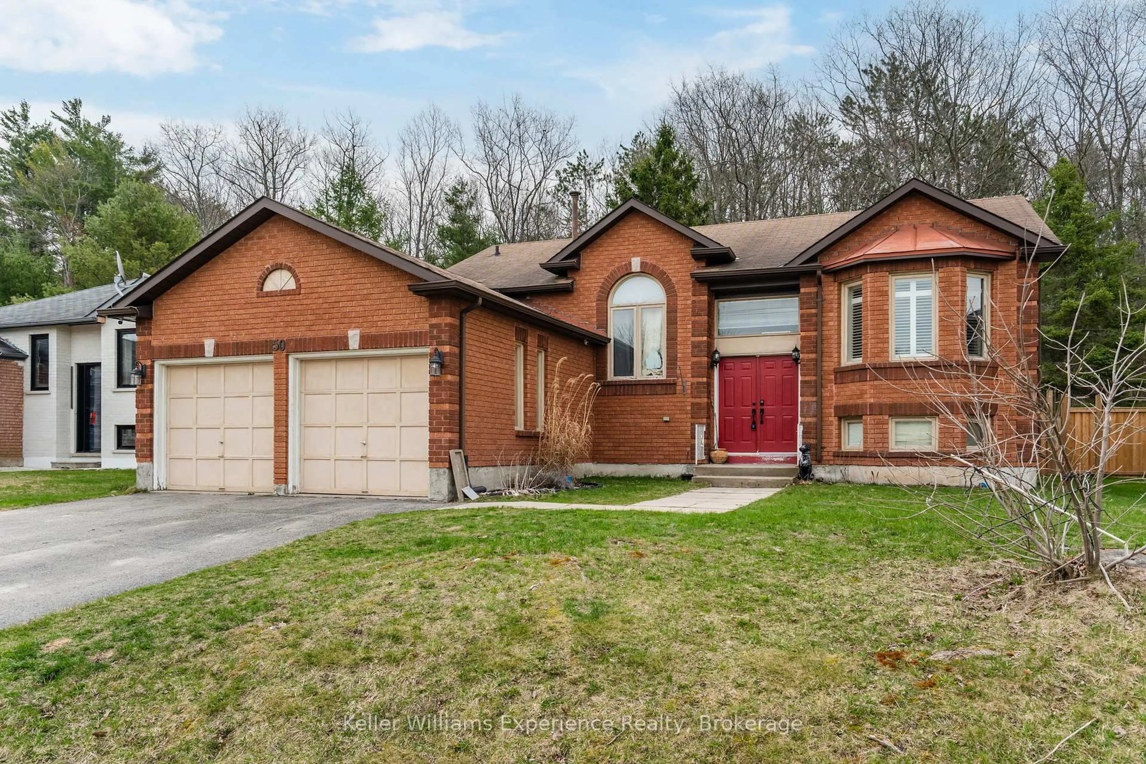 Home with brick exterior material, street for 50 Leo Blvd, Wasaga Beach Ontario L9Z 1C6