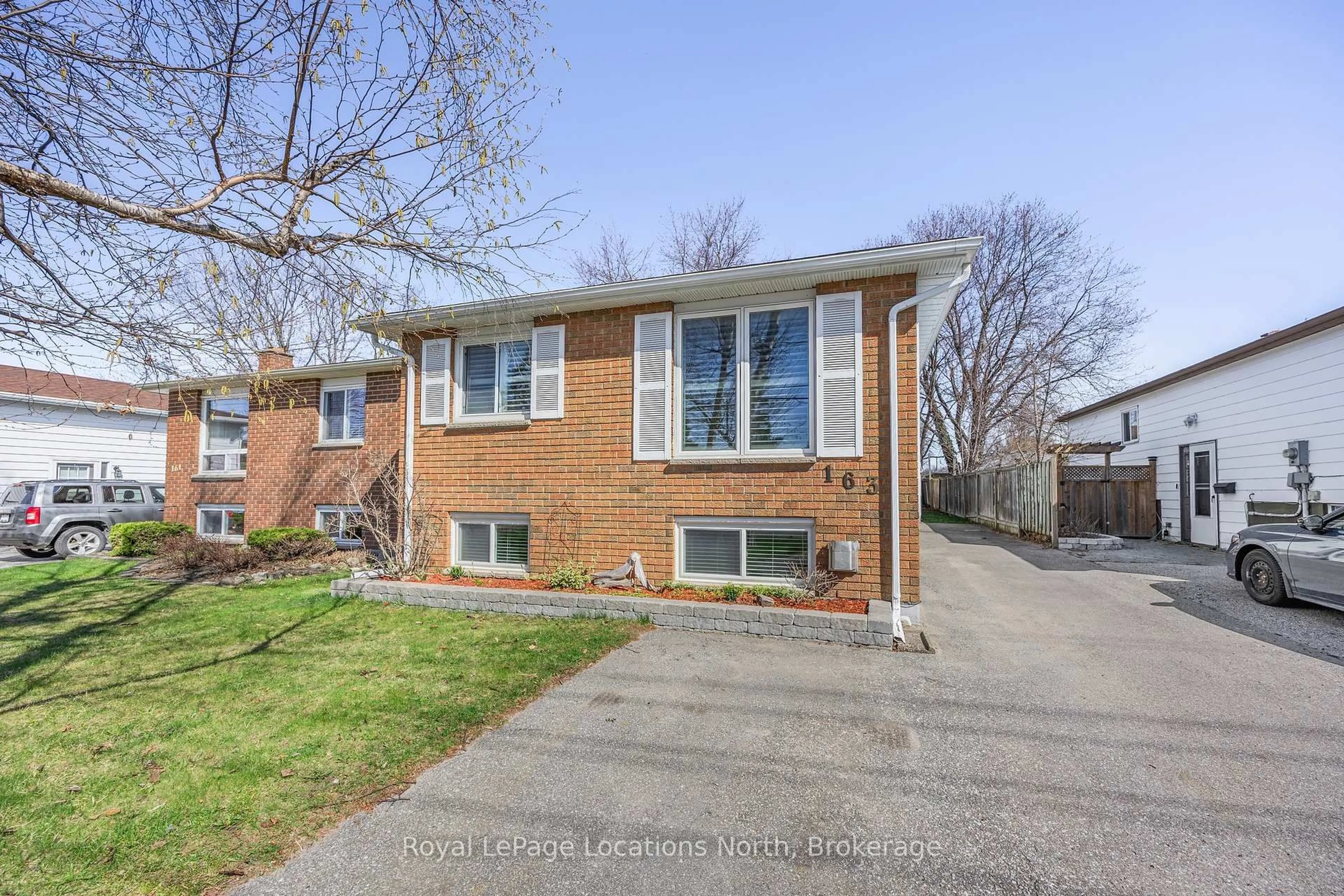 Home with brick exterior material, street for 163 Collins St, Collingwood Ontario L9Y 4L7