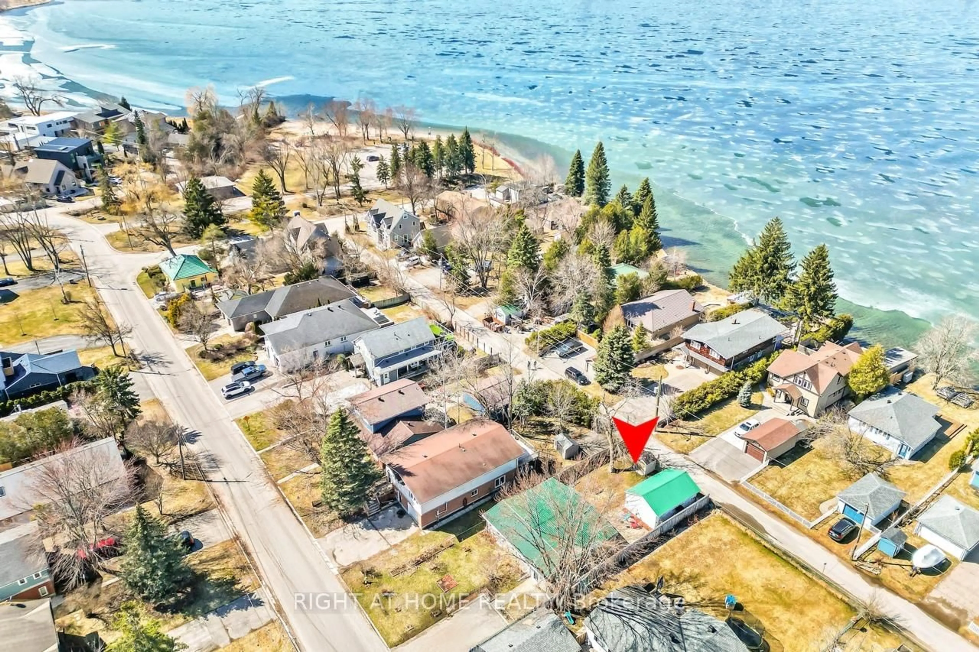 A pic from outside/outdoor area/front of a property/back of a property/a pic from drone, water/lake/river/ocean view for 24 Brennan Ave, Barrie Ontario L4N 3X3