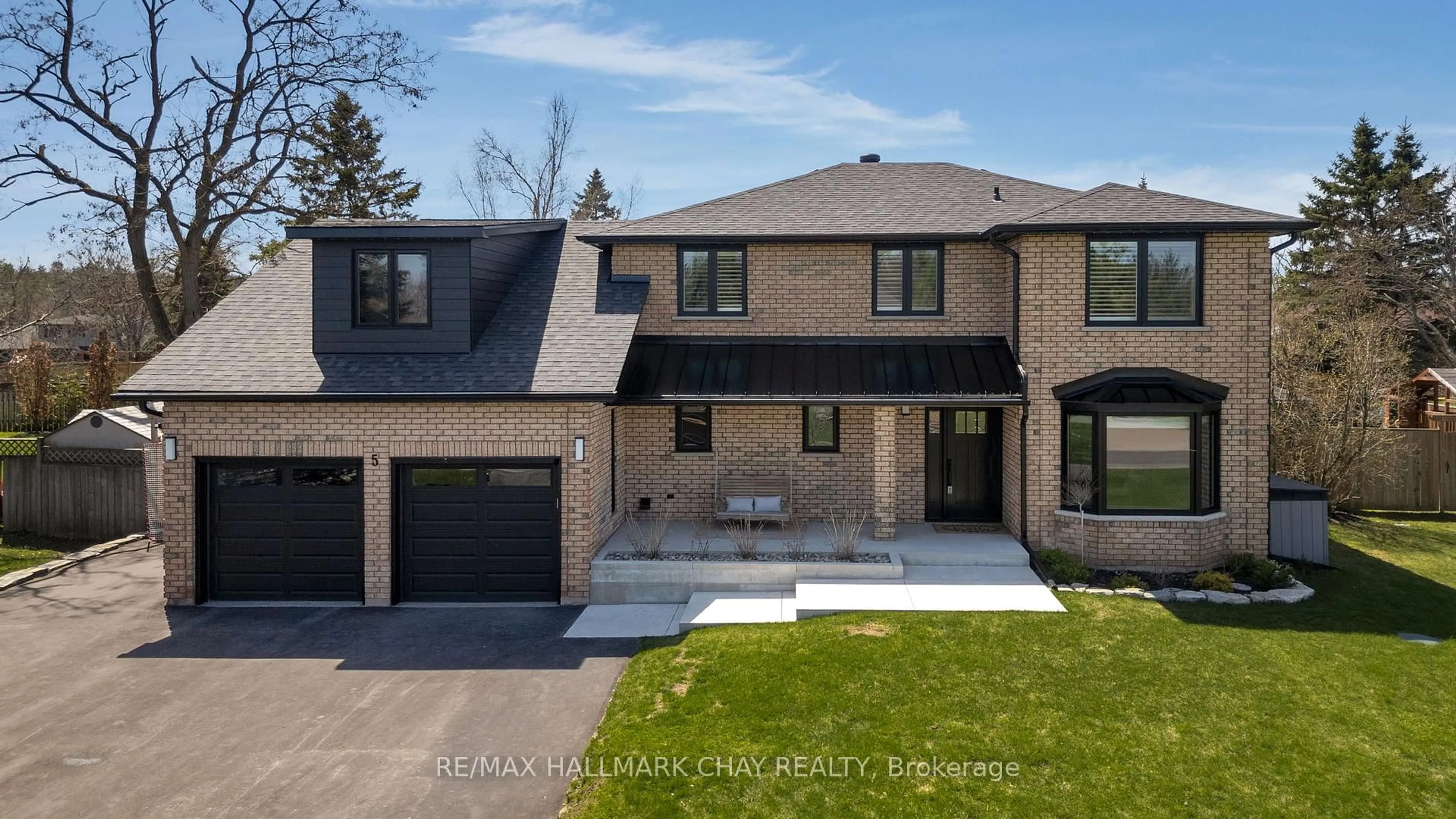 Home with brick exterior material, street for 5 Lilac Lane, Springwater Ontario L0L 1X1