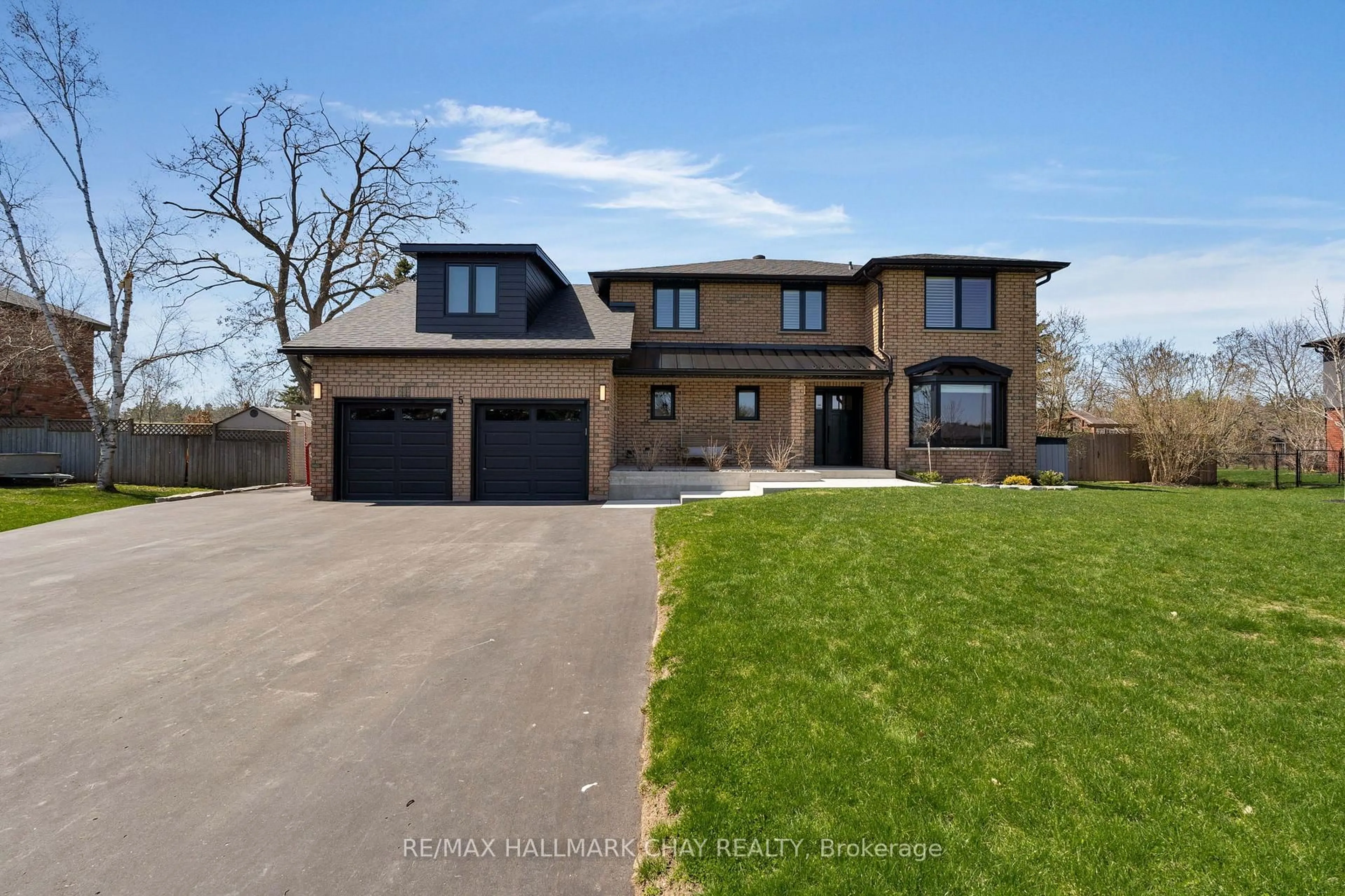 Home with brick exterior material, street for 5 Lilac Lane, Springwater Ontario L0L 1X1