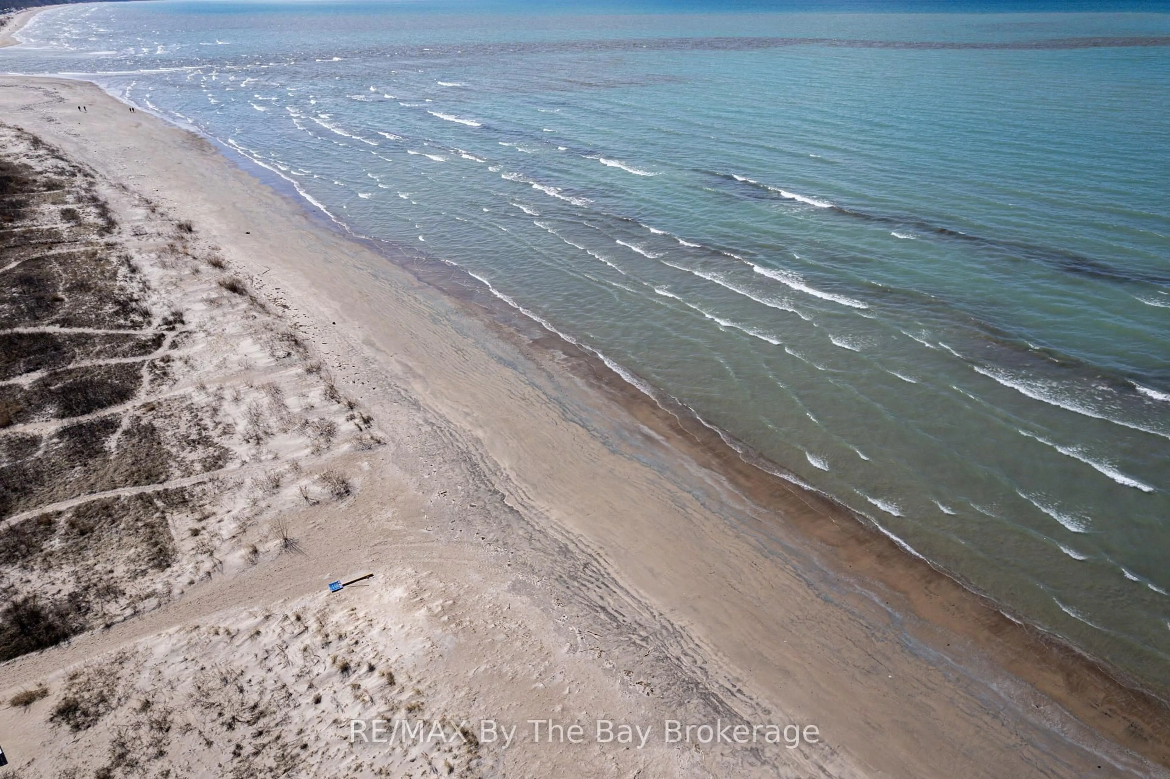 A pic from outside/outdoor area/front of a property/back of a property/a pic from drone, water/lake/river/ocean view for 278 Coastline Dr, Wasaga Beach Ontario L9Z 2M4