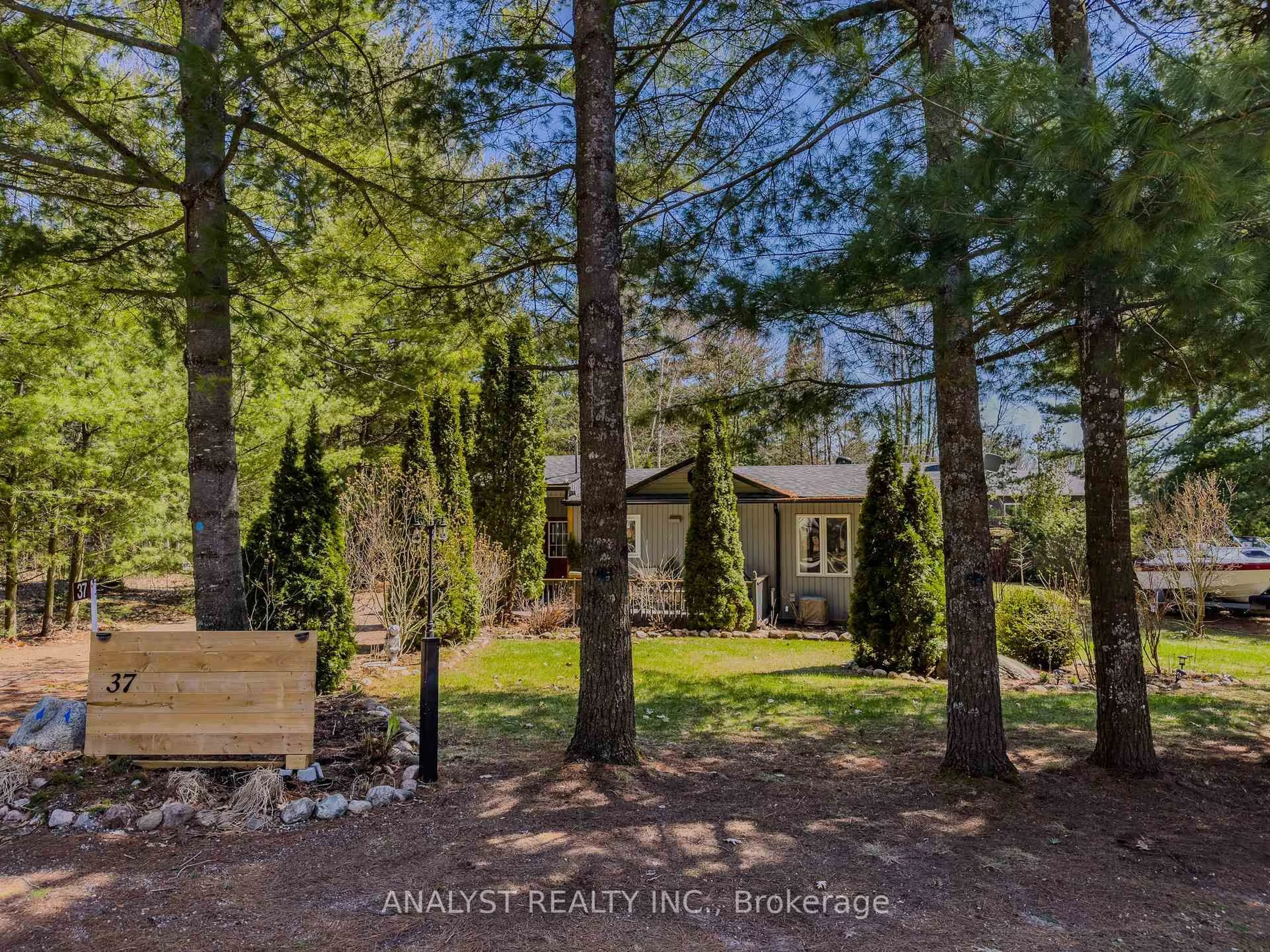 A pic from outside/outdoor area/front of a property/back of a property/a pic from drone, forest/trees view for 37 Lindale Ave, Tiny Ontario L9M 0J2