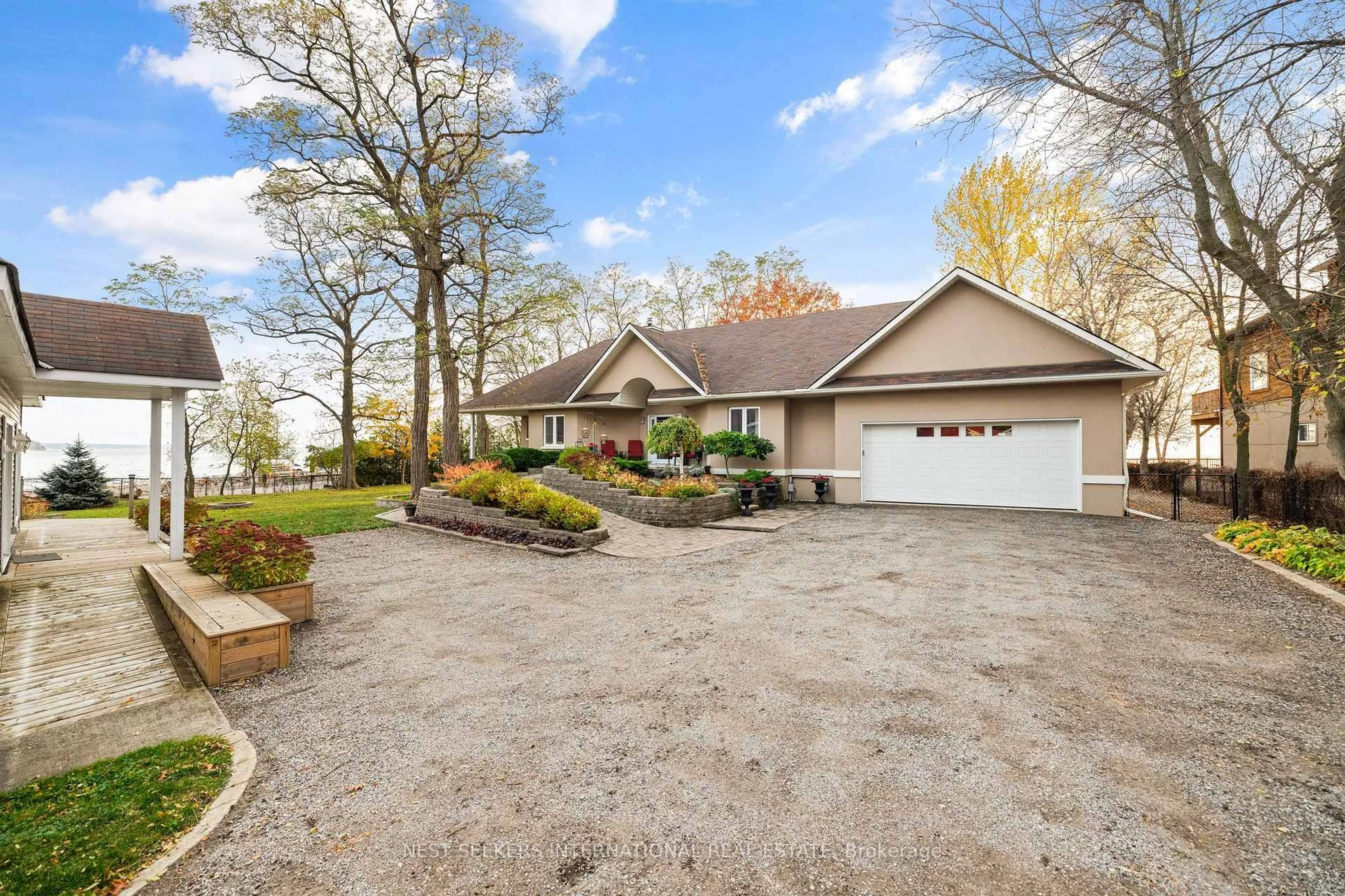 A pic from outside/outdoor area/front of a property/back of a property/a pic from drone, water/lake/river/ocean view for 20 Tiny Beaches Rd, Tiny Ontario L0L 2J0