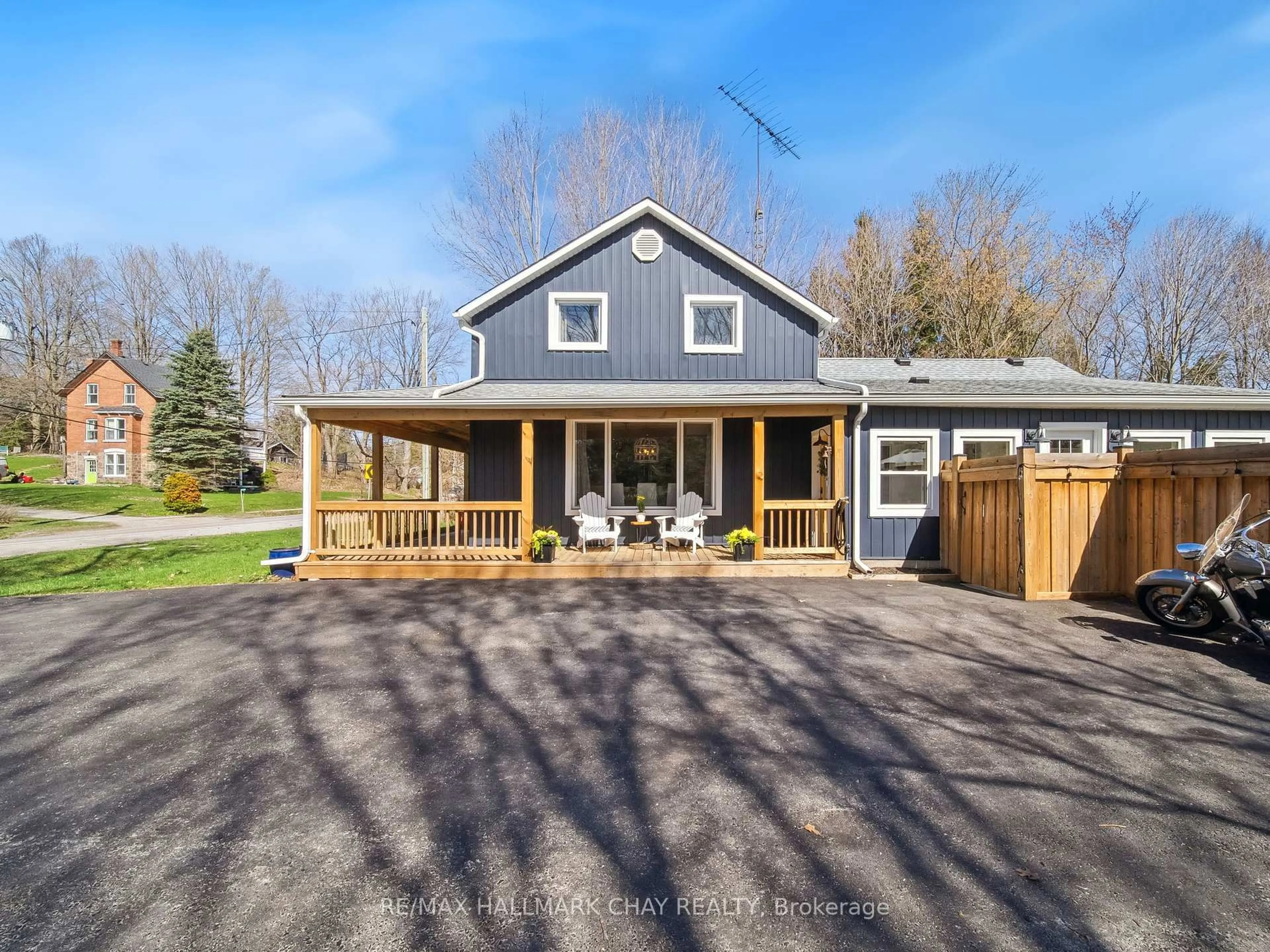 A pic from outside/outdoor area/front of a property/back of a property/a pic from drone, street for 4539 Penetanguishene Rd, Springwater Ontario L0L 1V0