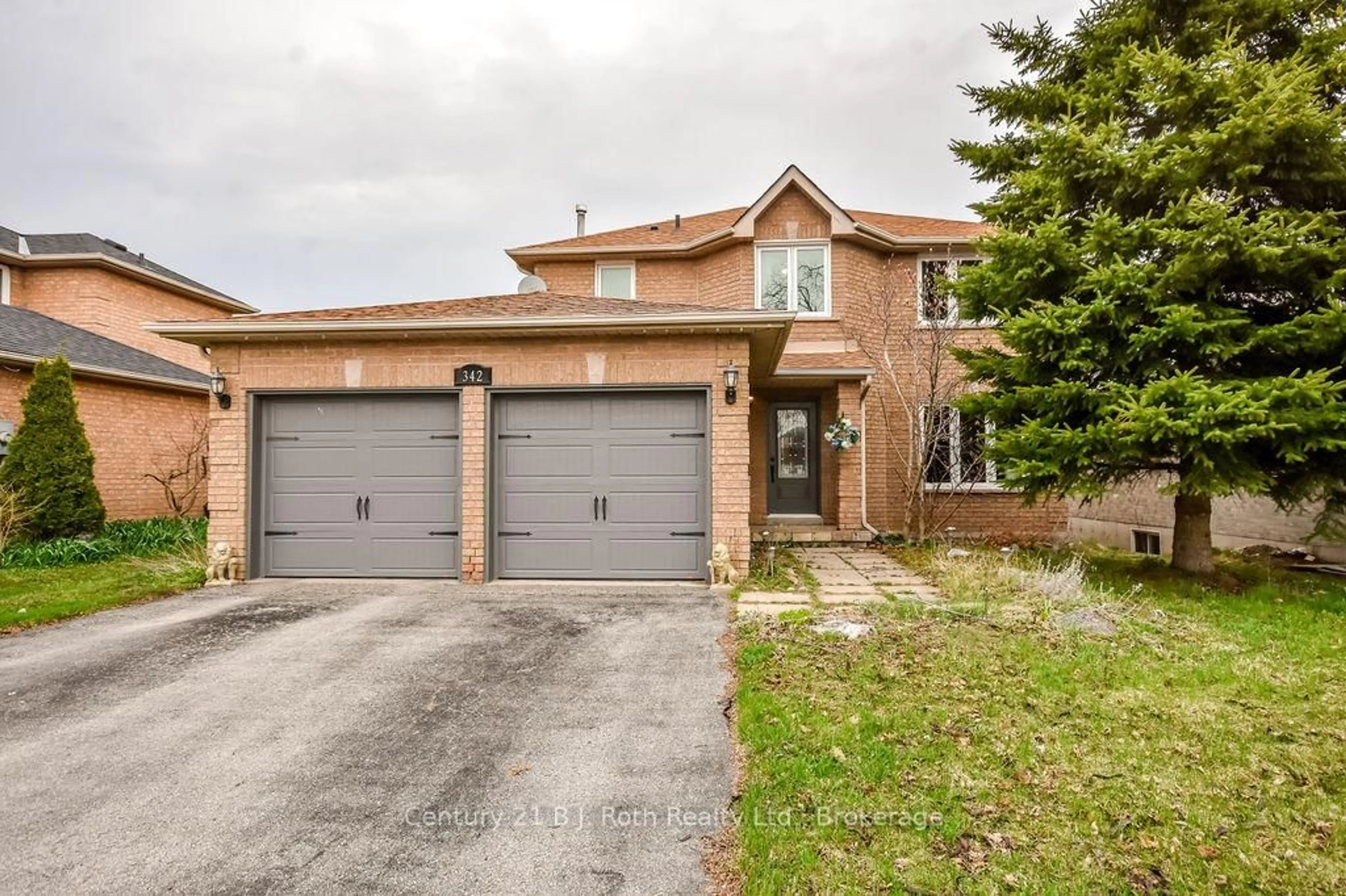 Home with brick exterior material, street for 342 CUNDLES Rd, Barrie Ontario L4N 7C8