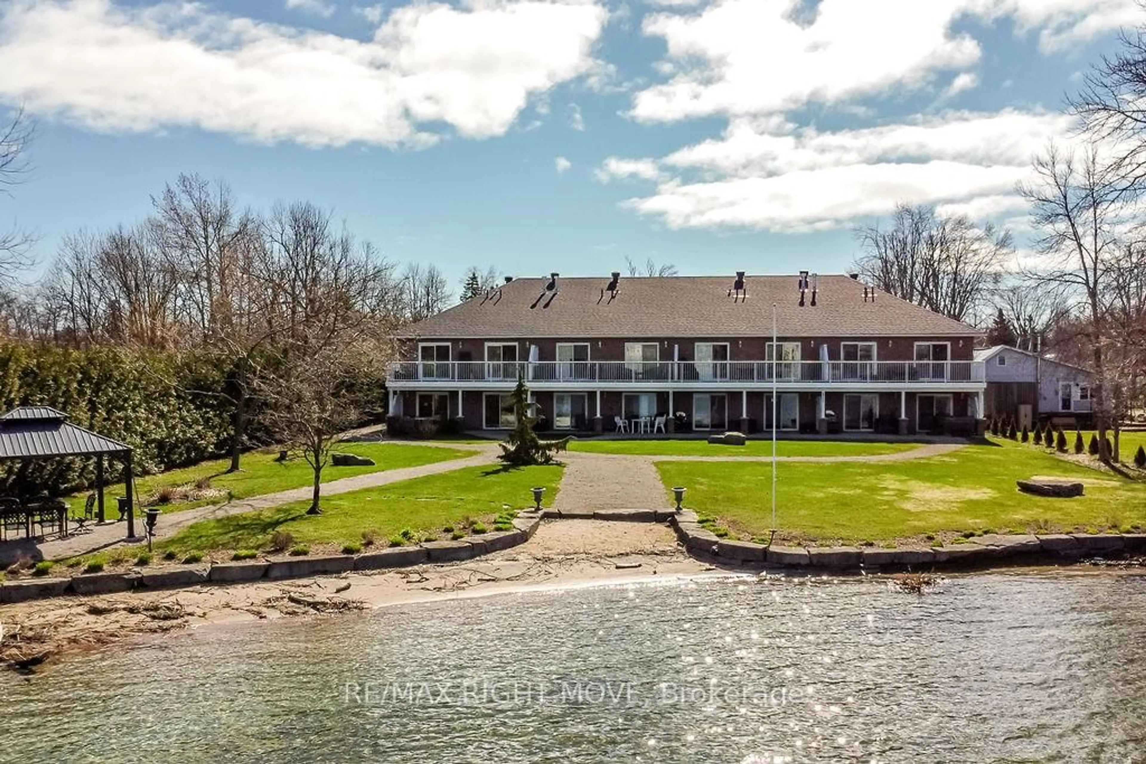 A pic from outside/outdoor area/front of a property/back of a property/a pic from drone, water/lake/river/ocean view for 43 Creighton St #104, Ramara Ontario L3V 1B1