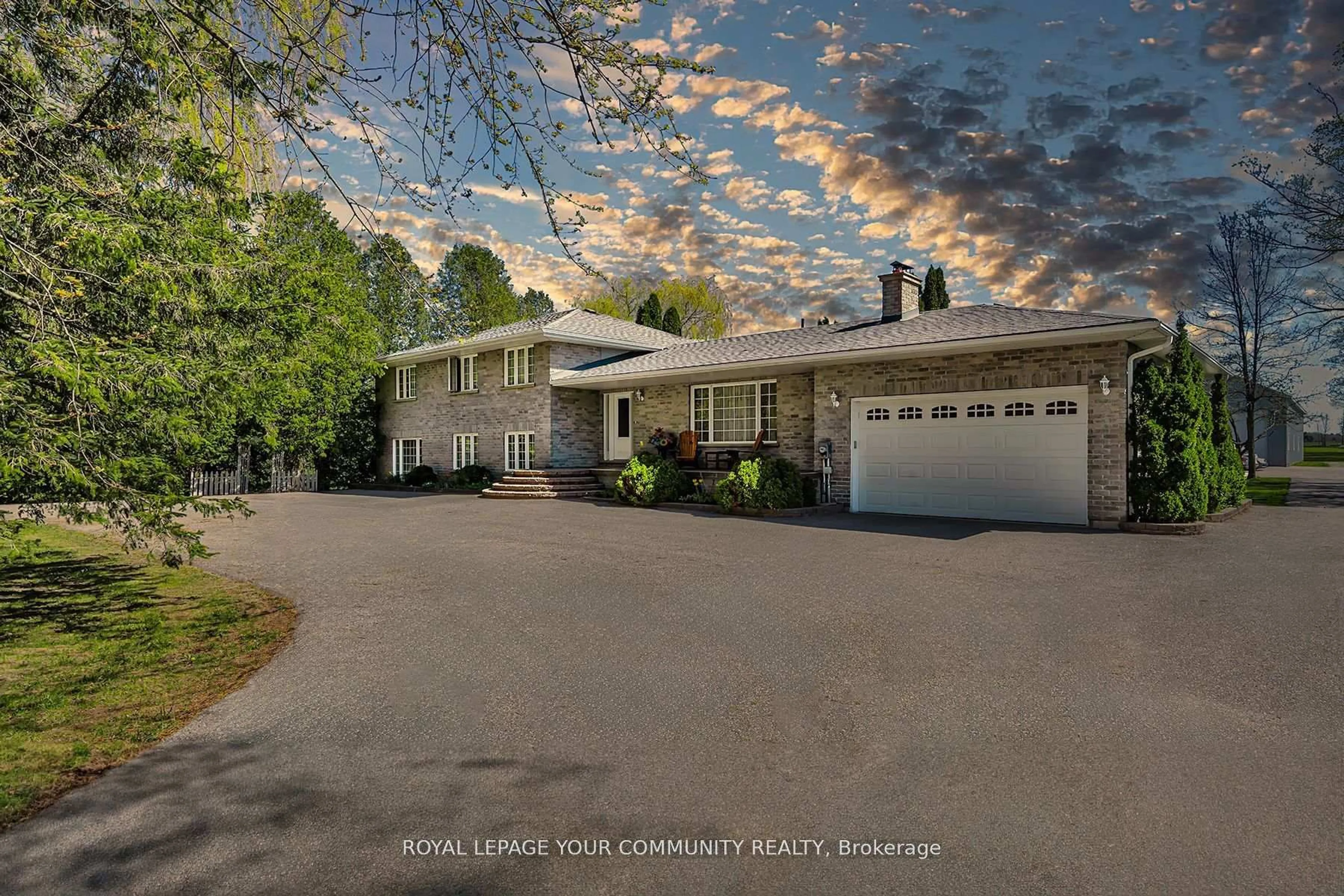 A pic from outside/outdoor area/front of a property/back of a property/a pic from drone, street for 2449 Old Second Rd, Springwater Ontario L0L 1V0