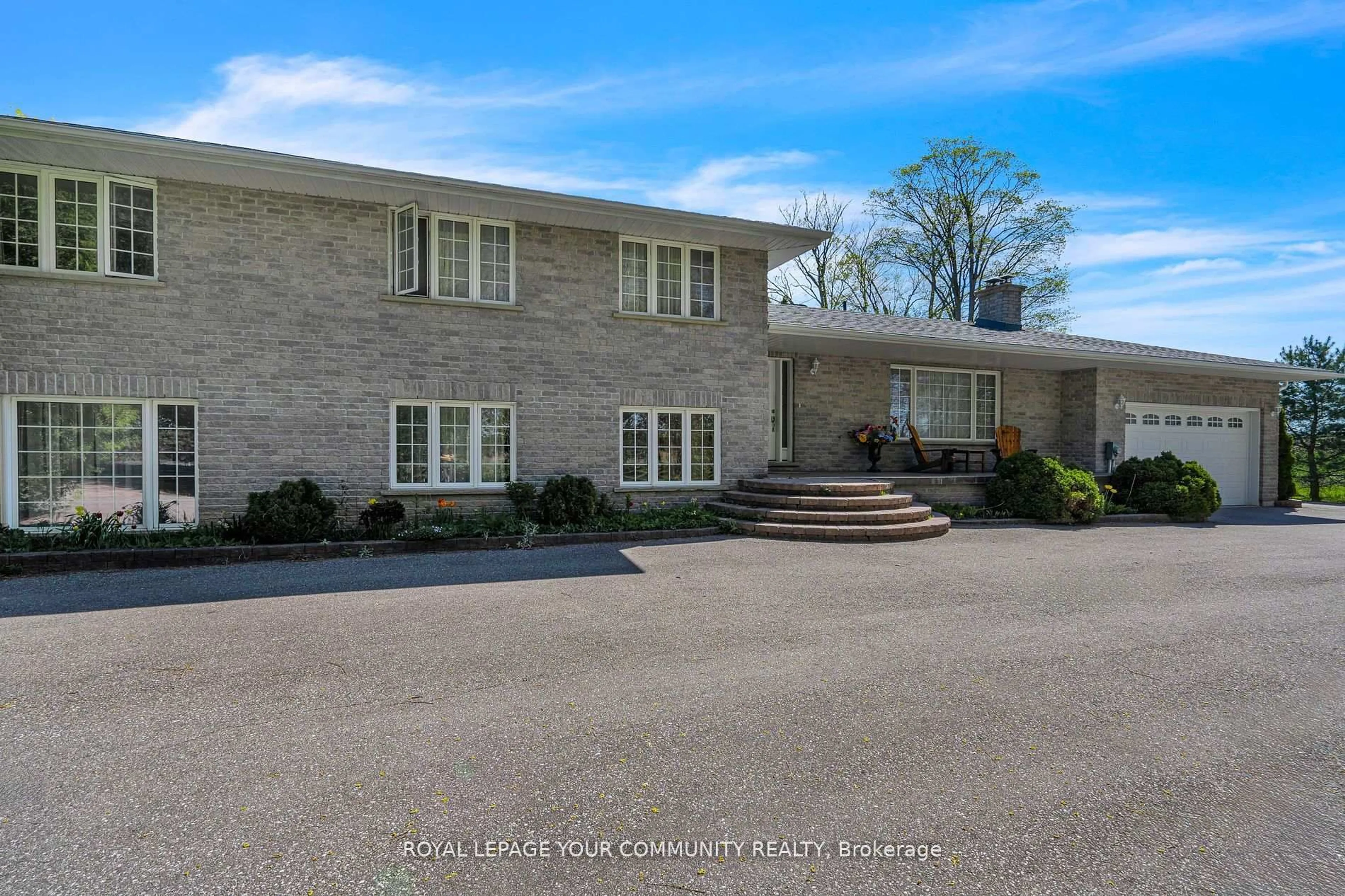 A pic from outside/outdoor area/front of a property/back of a property/a pic from drone, unknown for 2449 Old Second Rd, Springwater Ontario L0L 1V0