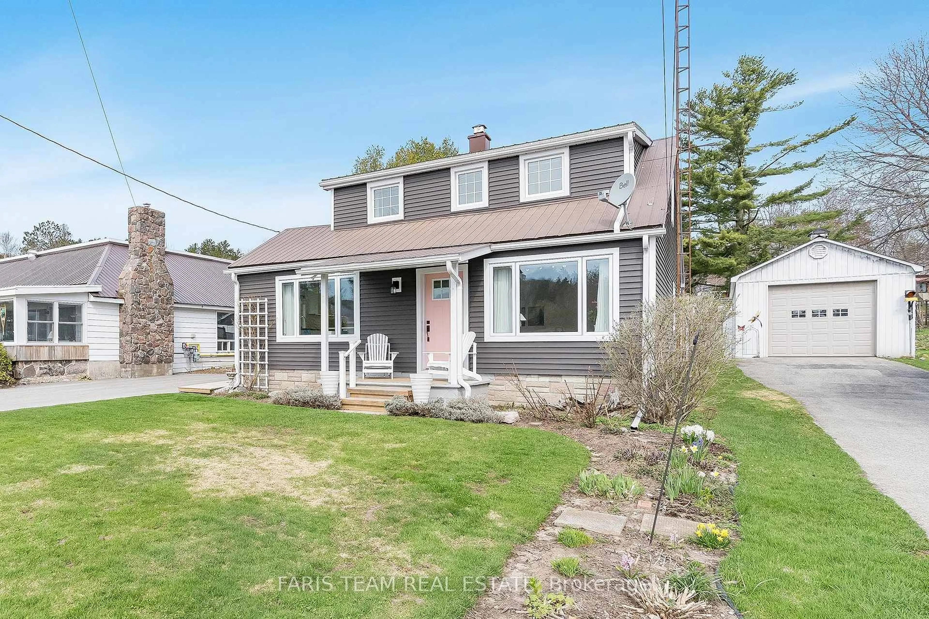 A pic from outside/outdoor area/front of a property/back of a property/a pic from drone, street for 598 Champlain Rd, Tiny Ontario L9M 0C2