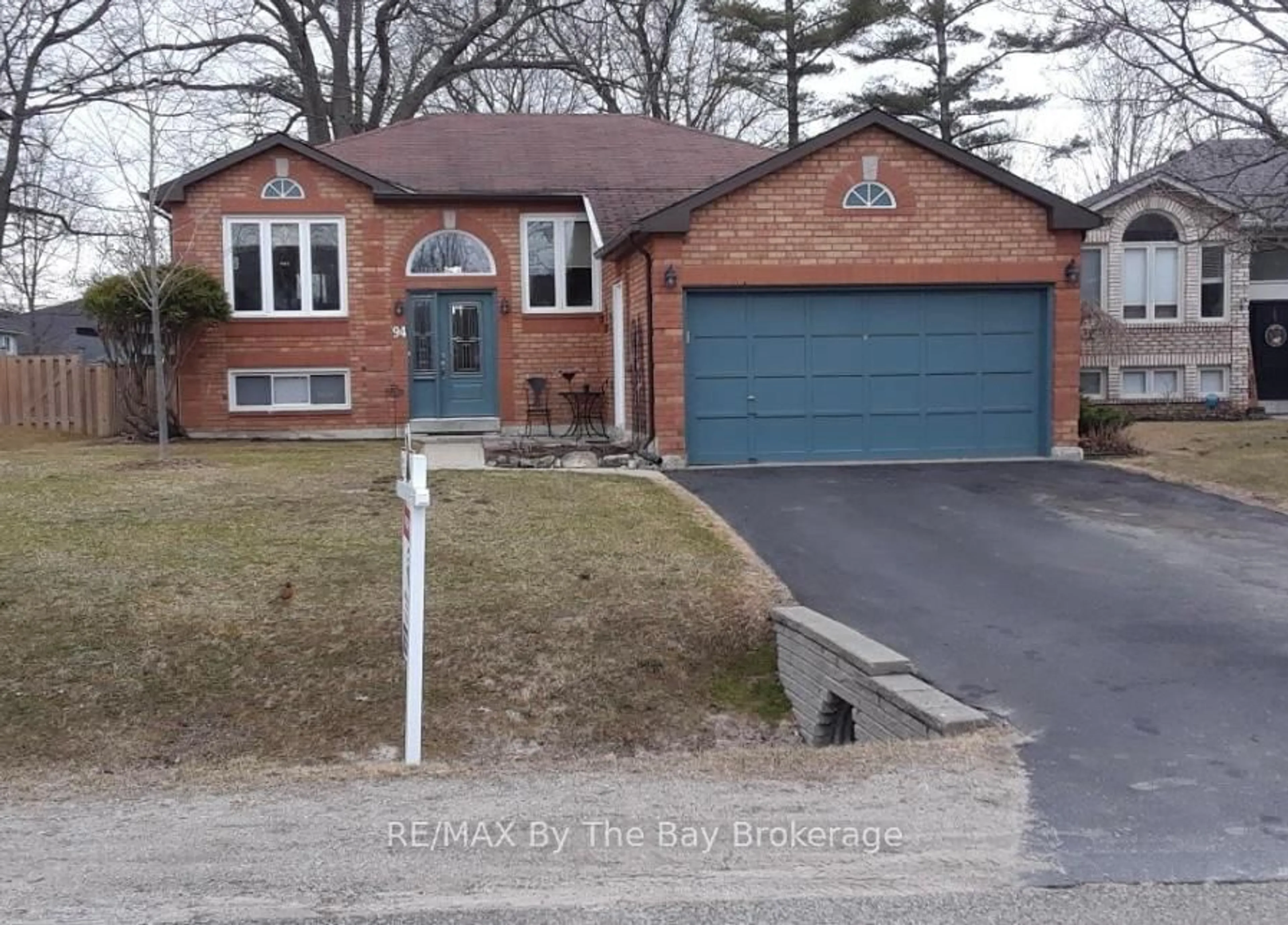 Home with brick exterior material, street for 94 Leo Blvd, Wasaga Beach Ontario L9Z 1C5