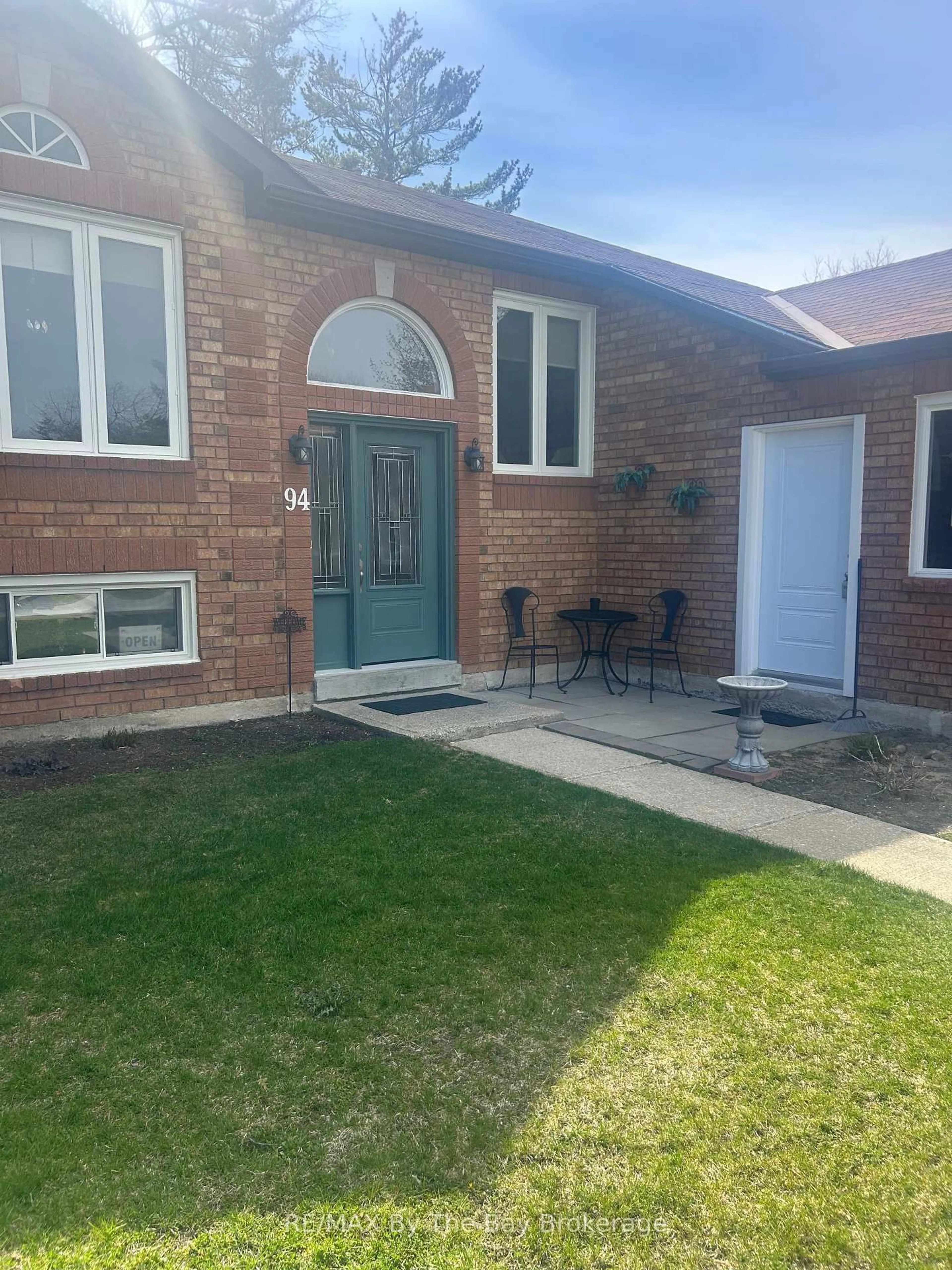 Home with brick exterior material, street for 94 Leo Blvd, Wasaga Beach Ontario L9Z 1C5