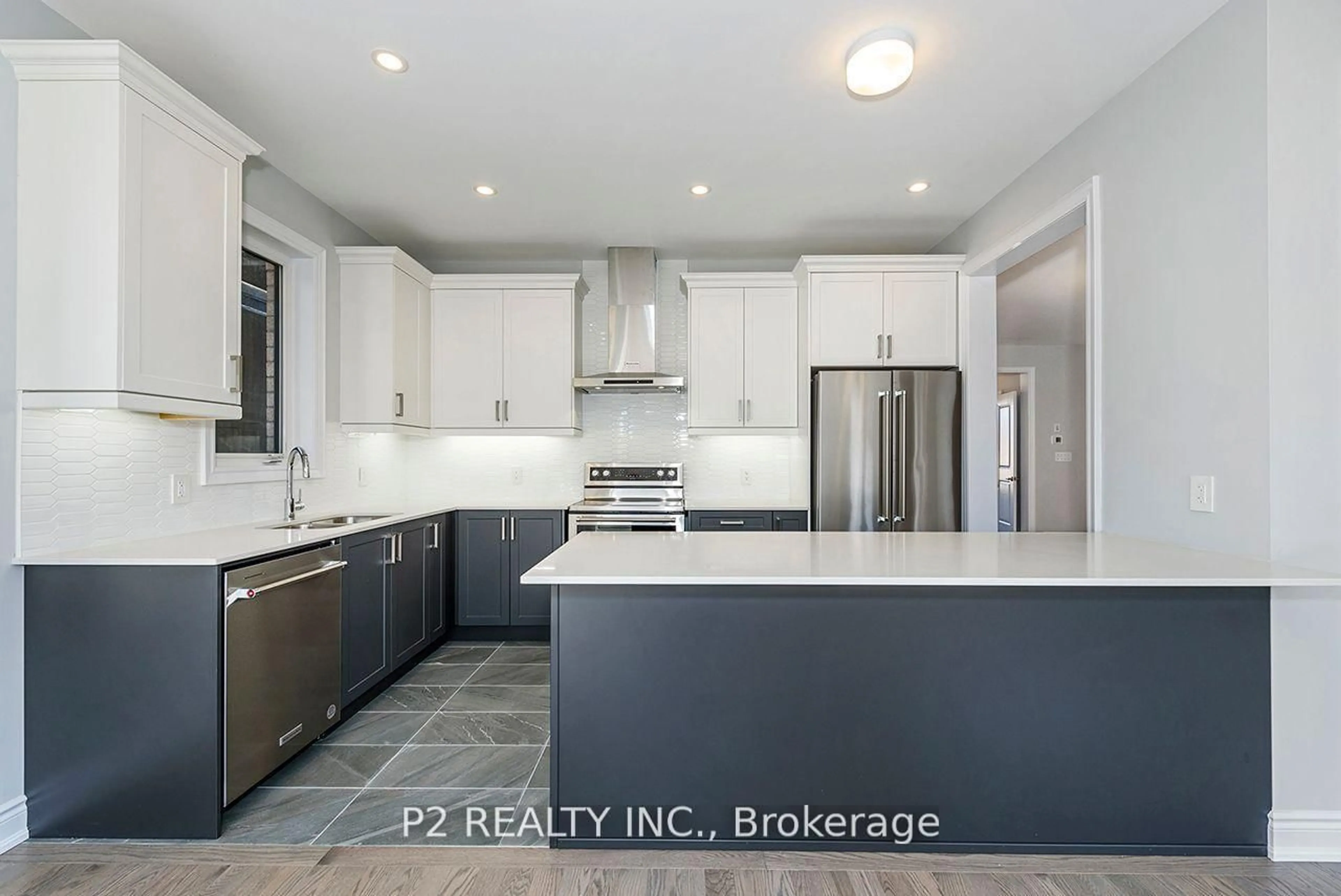 Open concept kitchen, ceramic/tile floor for 16 Wild Ginger Lane, Springwater Ontario L9X 2E4