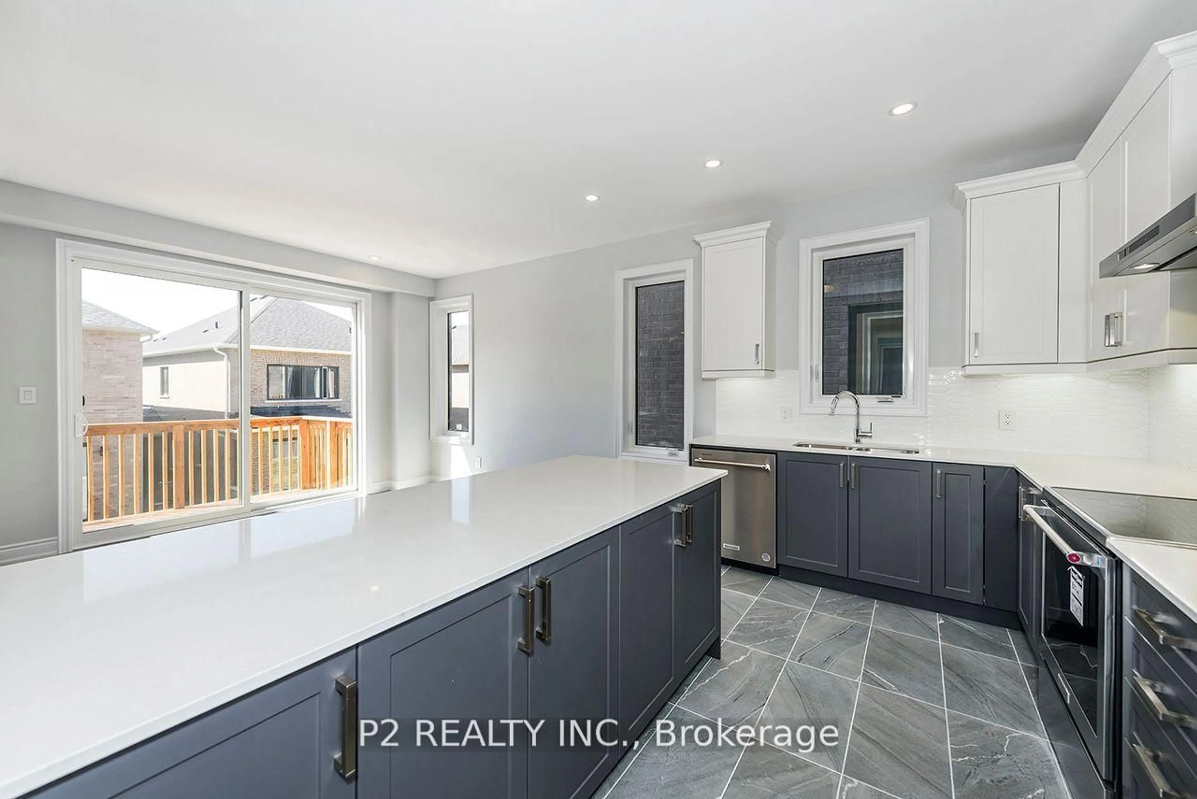 Open concept kitchen, ceramic/tile floor for 16 Wild Ginger Lane, Springwater Ontario L9X 2E4