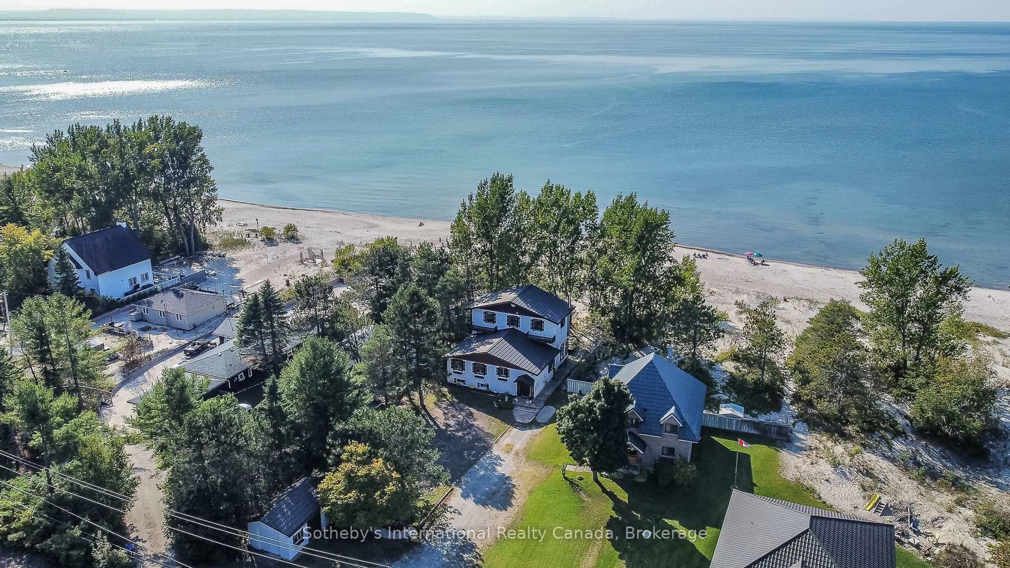 A pic from outside/outdoor area/front of a property/back of a property/a pic from drone, water/lake/river/ocean view for 14 JAMES St, Tiny Ontario L0L 2T0