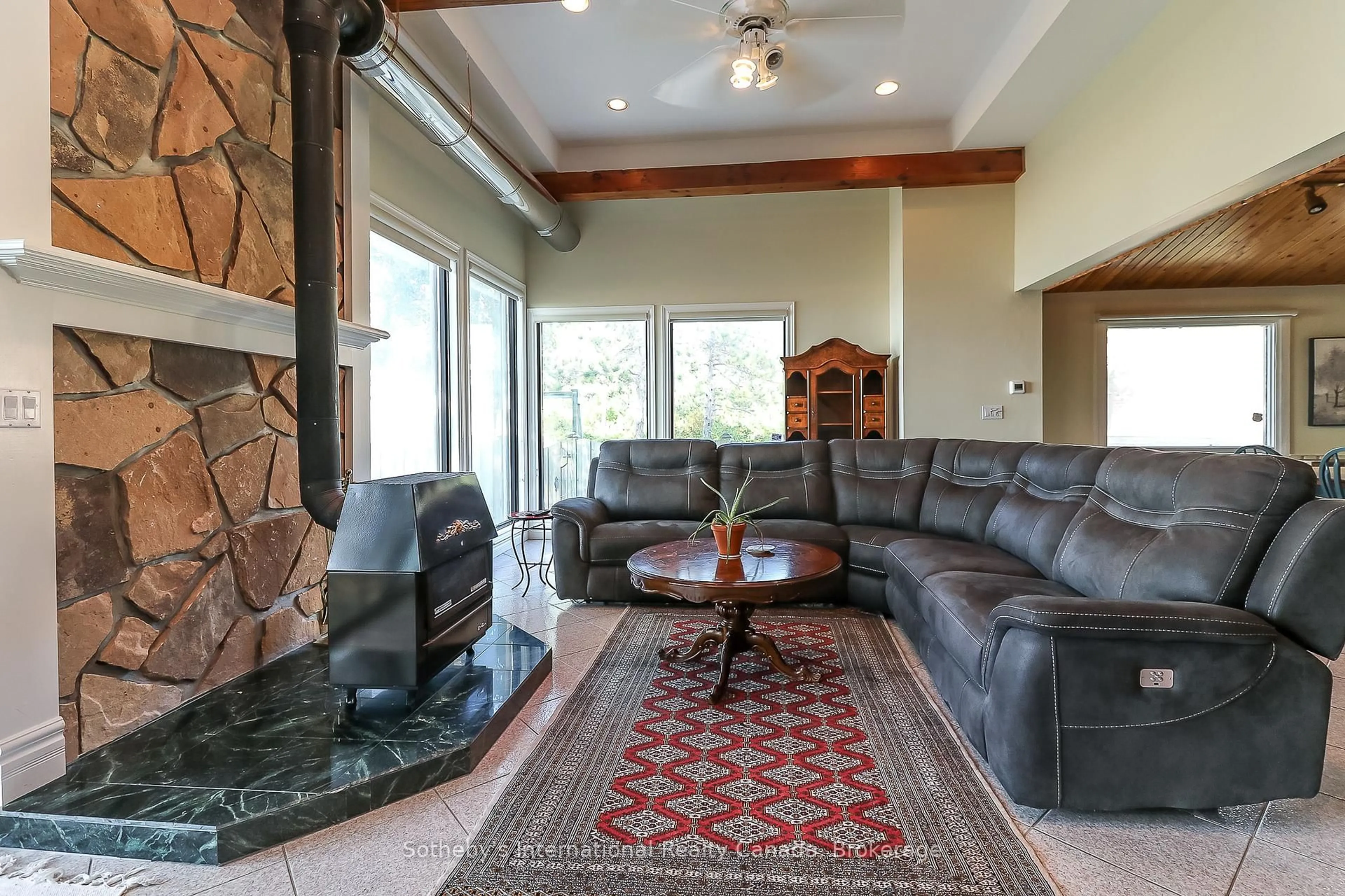 Living room with furniture, ceramic/tile floor for 14 JAMES St, Tiny Ontario L0L 2T0