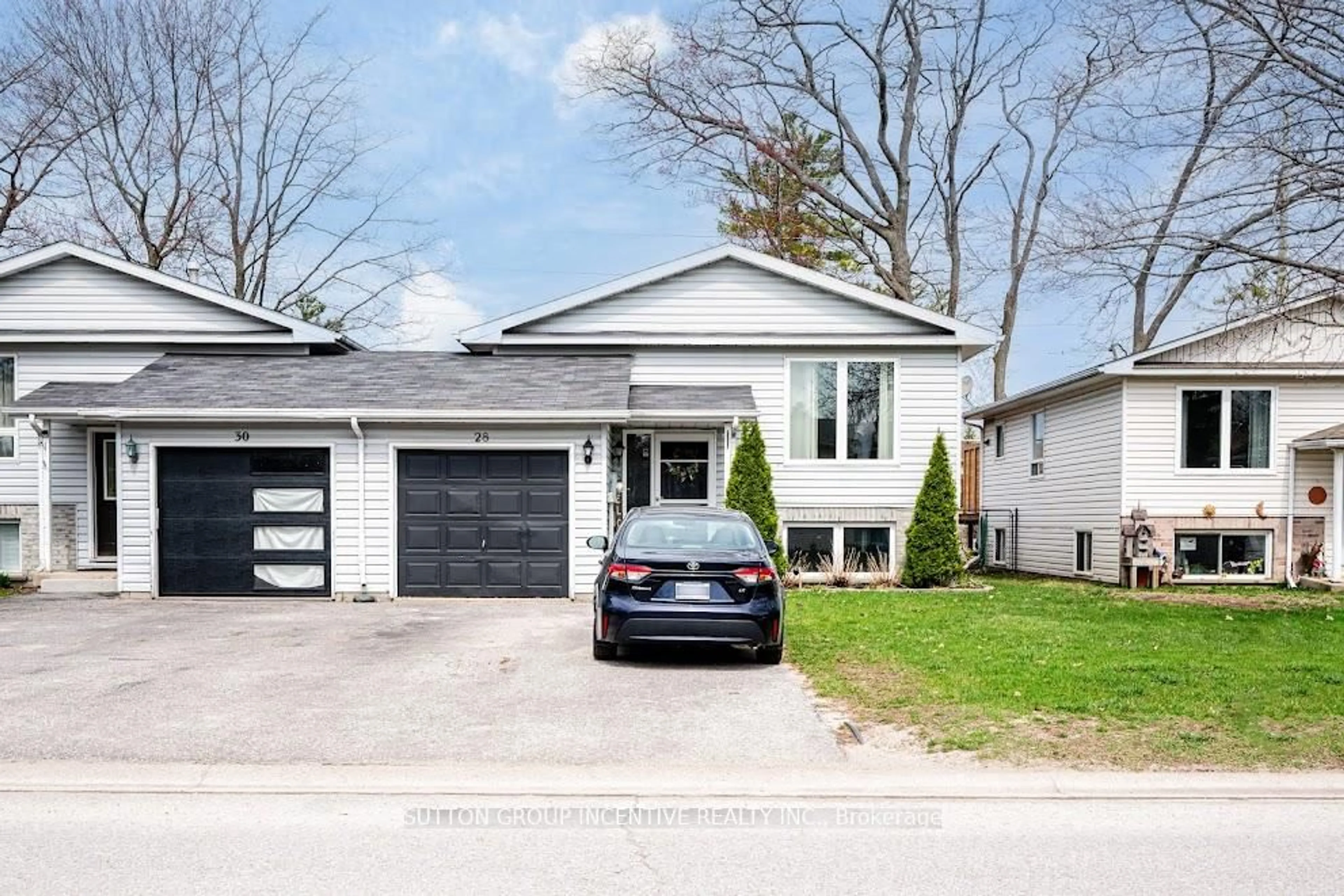 Home with brick exterior material, street for 28 Dyer Dr, Wasaga Beach Ontario L9Z 1E2