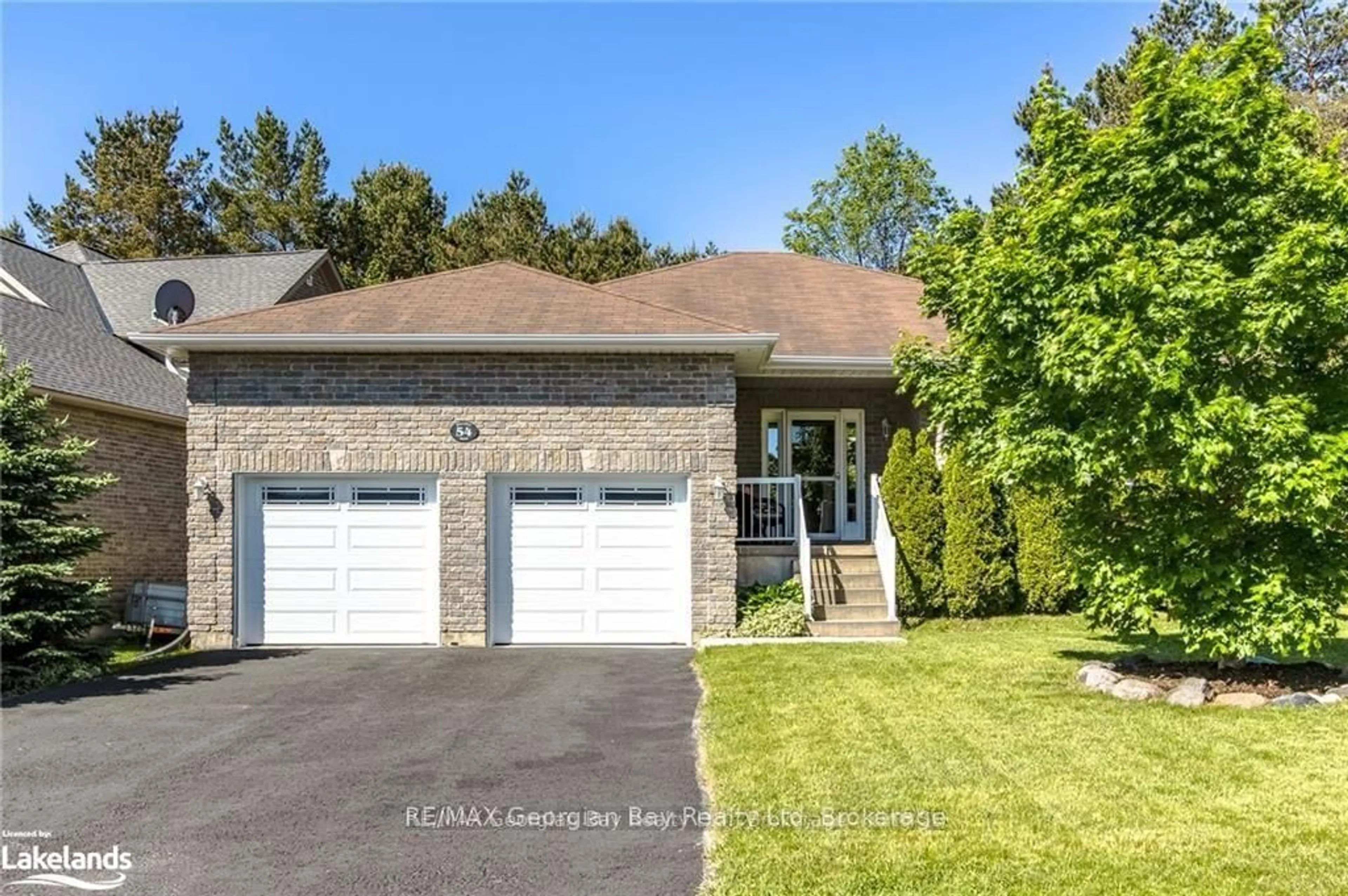 Home with brick exterior material, street for 54 Bellisle Rd, Penetanguishene Ontario L9M 0A3