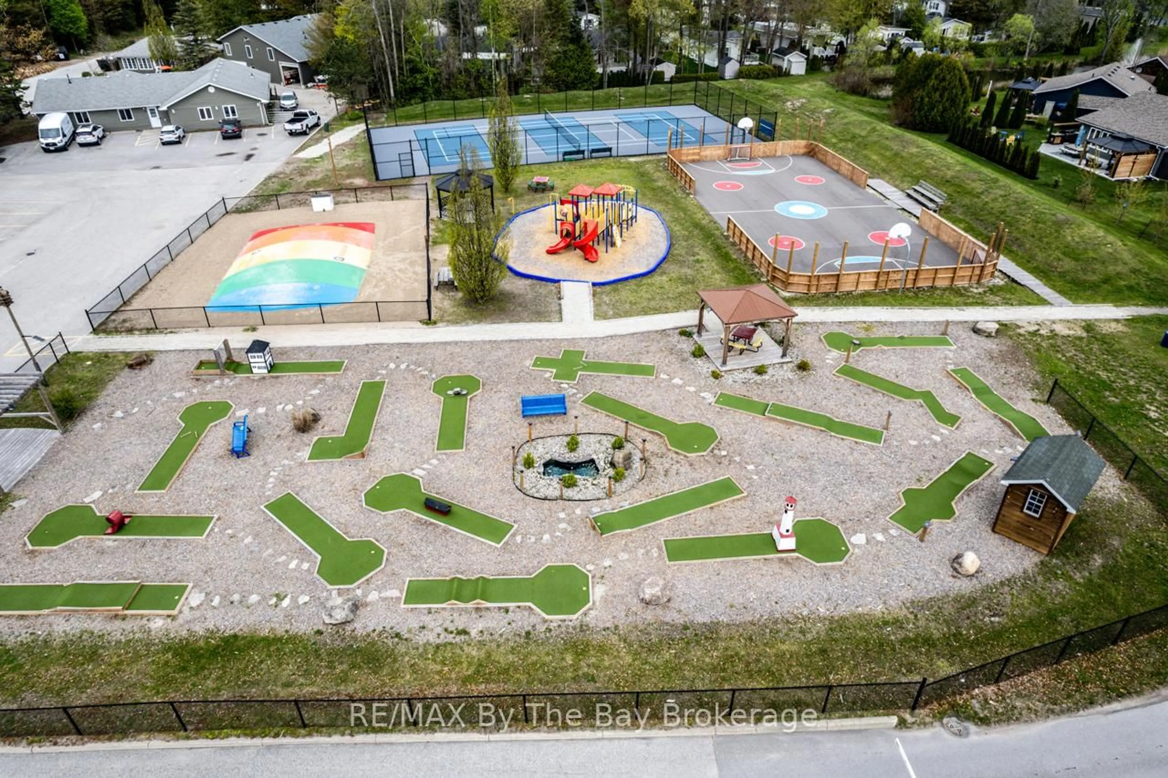 A pic from outside/outdoor area/front of a property/back of a property/a pic from drone, unknown for 85 THEME PARK Dr #222, Wasaga Beach Ontario L9Z 1X7