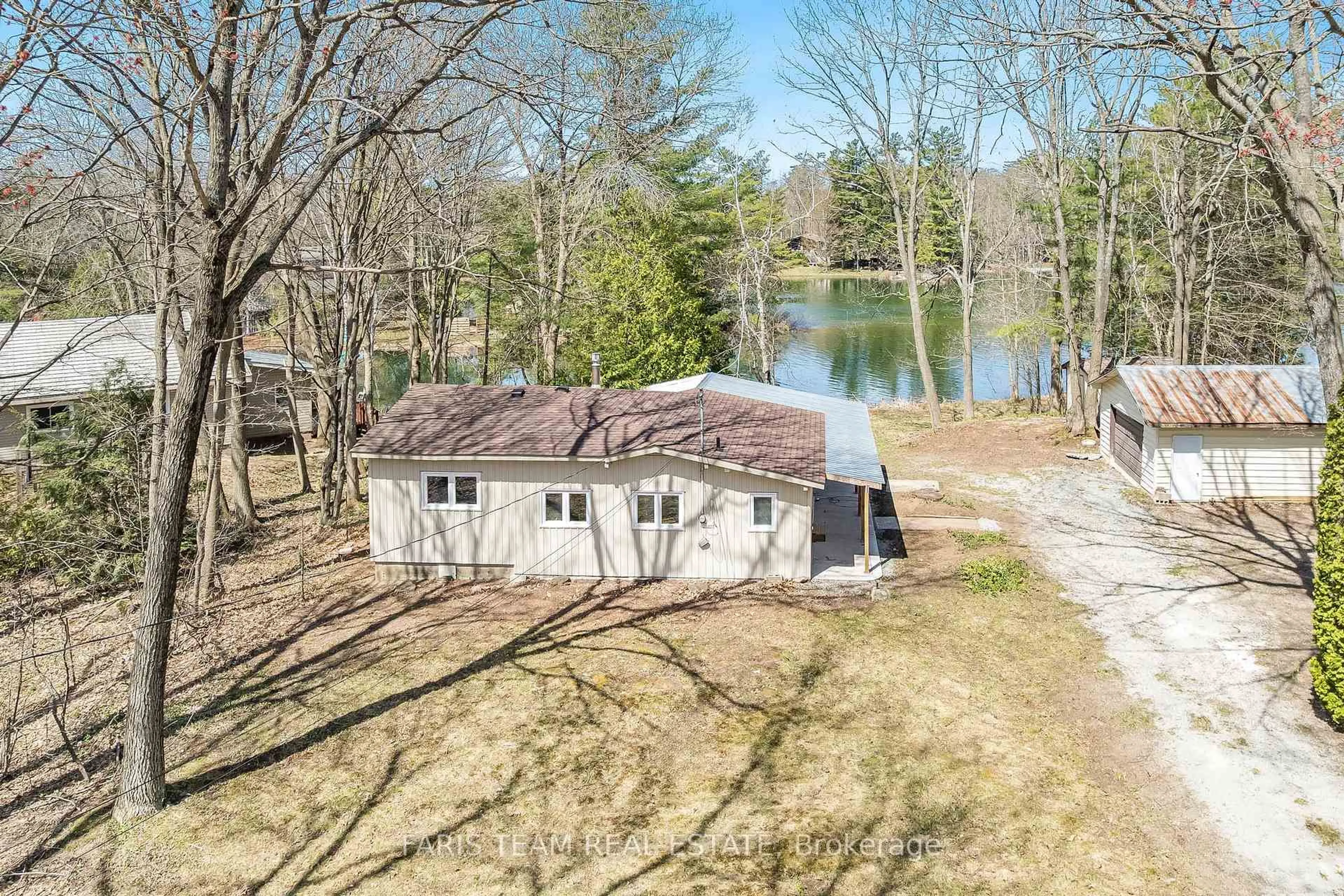 A pic from outside/outdoor area/front of a property/back of a property/a pic from drone, water/lake/river/ocean view for 7604 South River Rd, Ramara Ontario L0K 2B0