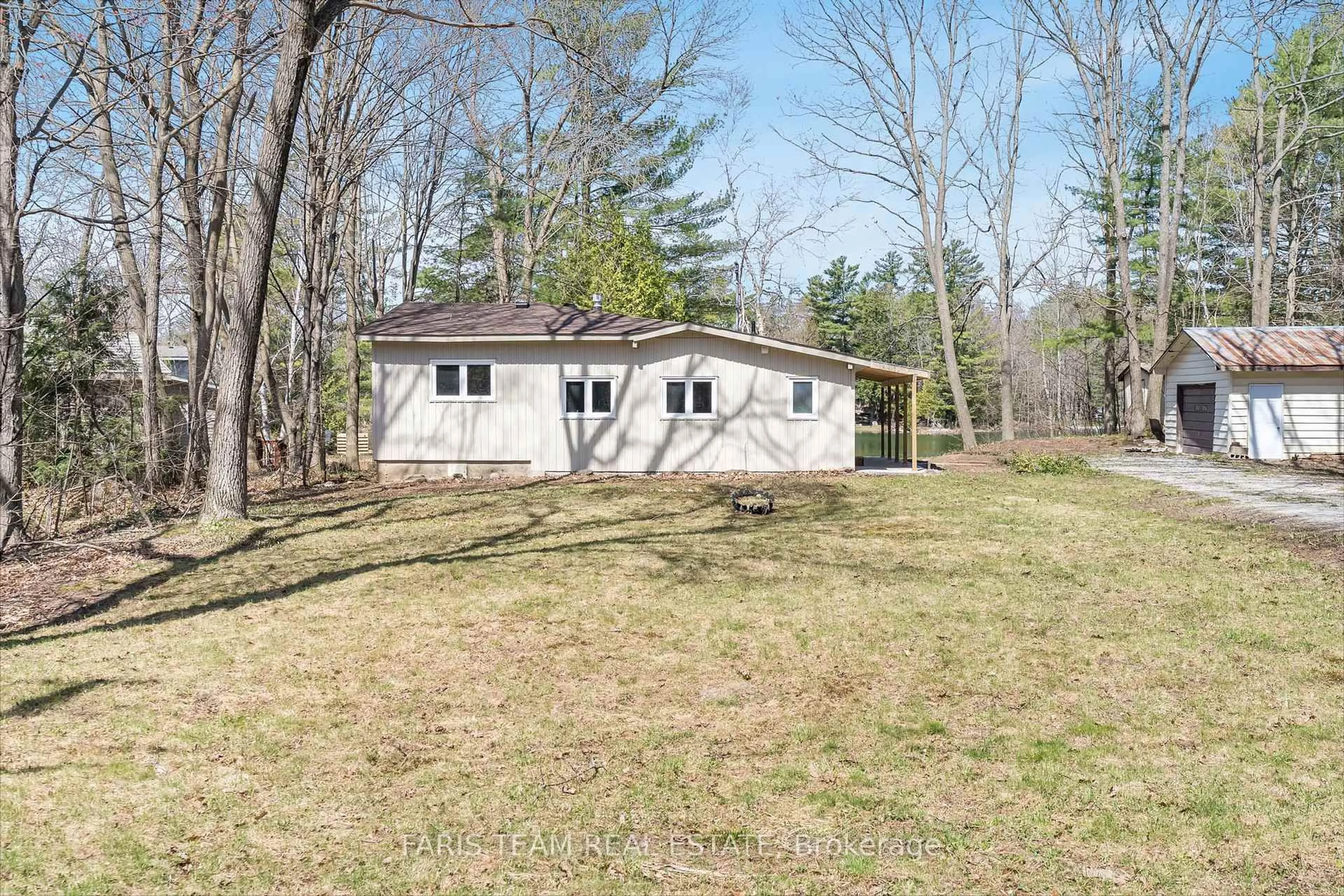 A pic from outside/outdoor area/front of a property/back of a property/a pic from drone, unknown for 7604 South River Rd, Ramara Ontario L0K 2B0