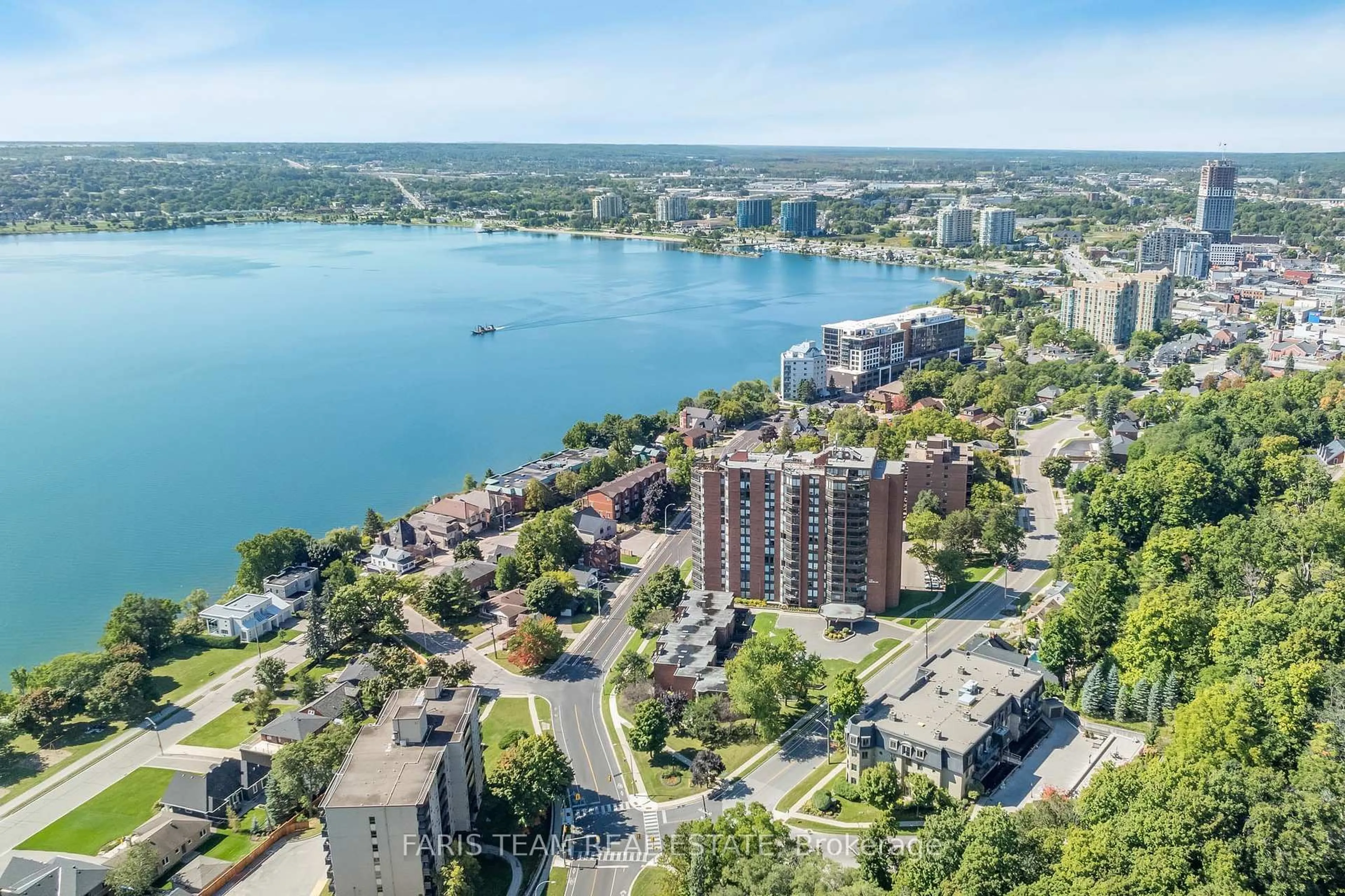 A pic from outside/outdoor area/front of a property/back of a property/a pic from drone, water/lake/river/ocean view for 181 Collier St #106, Barrie Ontario L4M 5L6