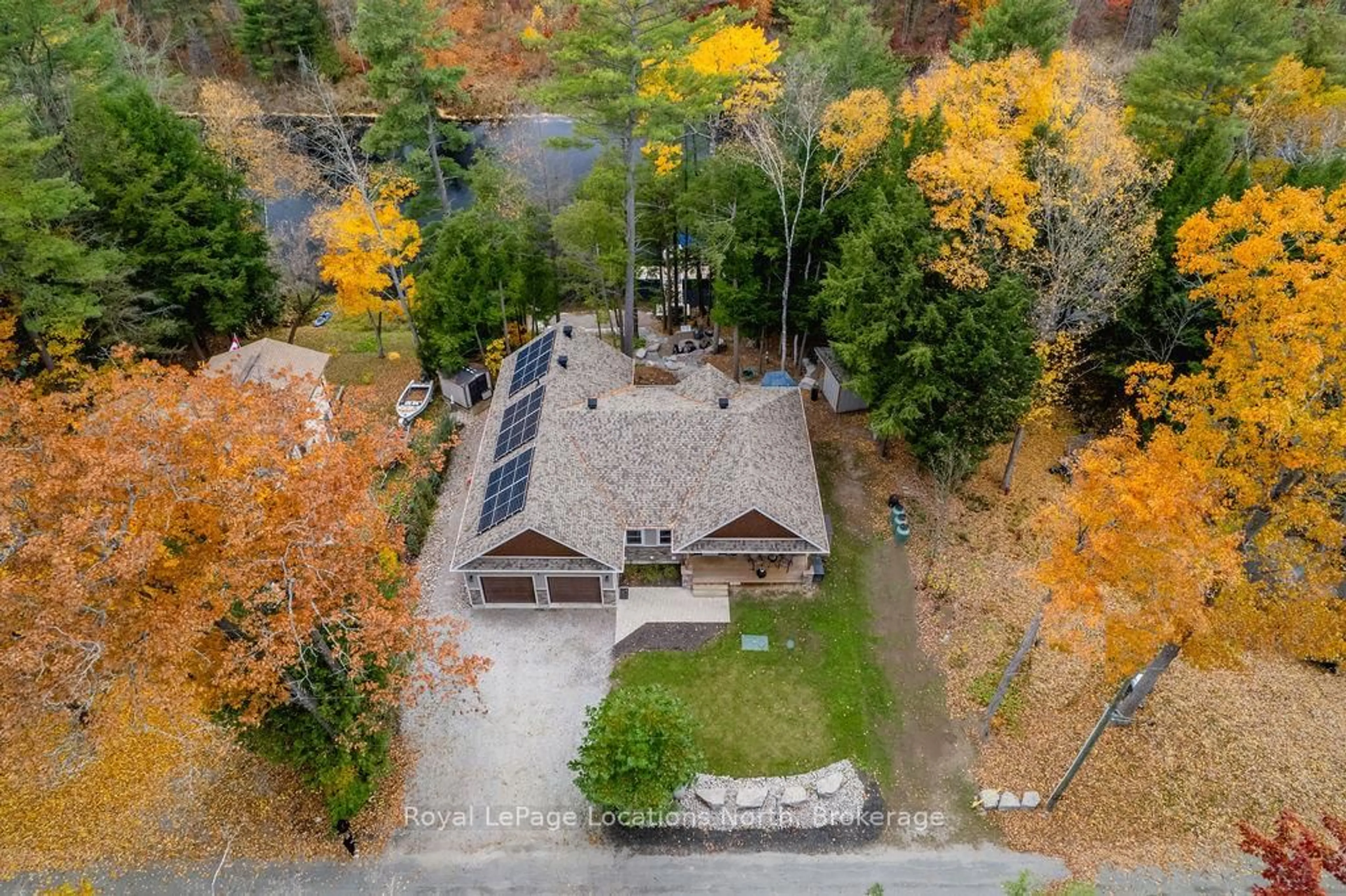 A pic from outside/outdoor area/front of a property/back of a property/a pic from drone, forest/trees view for 1035 Laidlaw Ave, Severn Ontario L0K 2B0