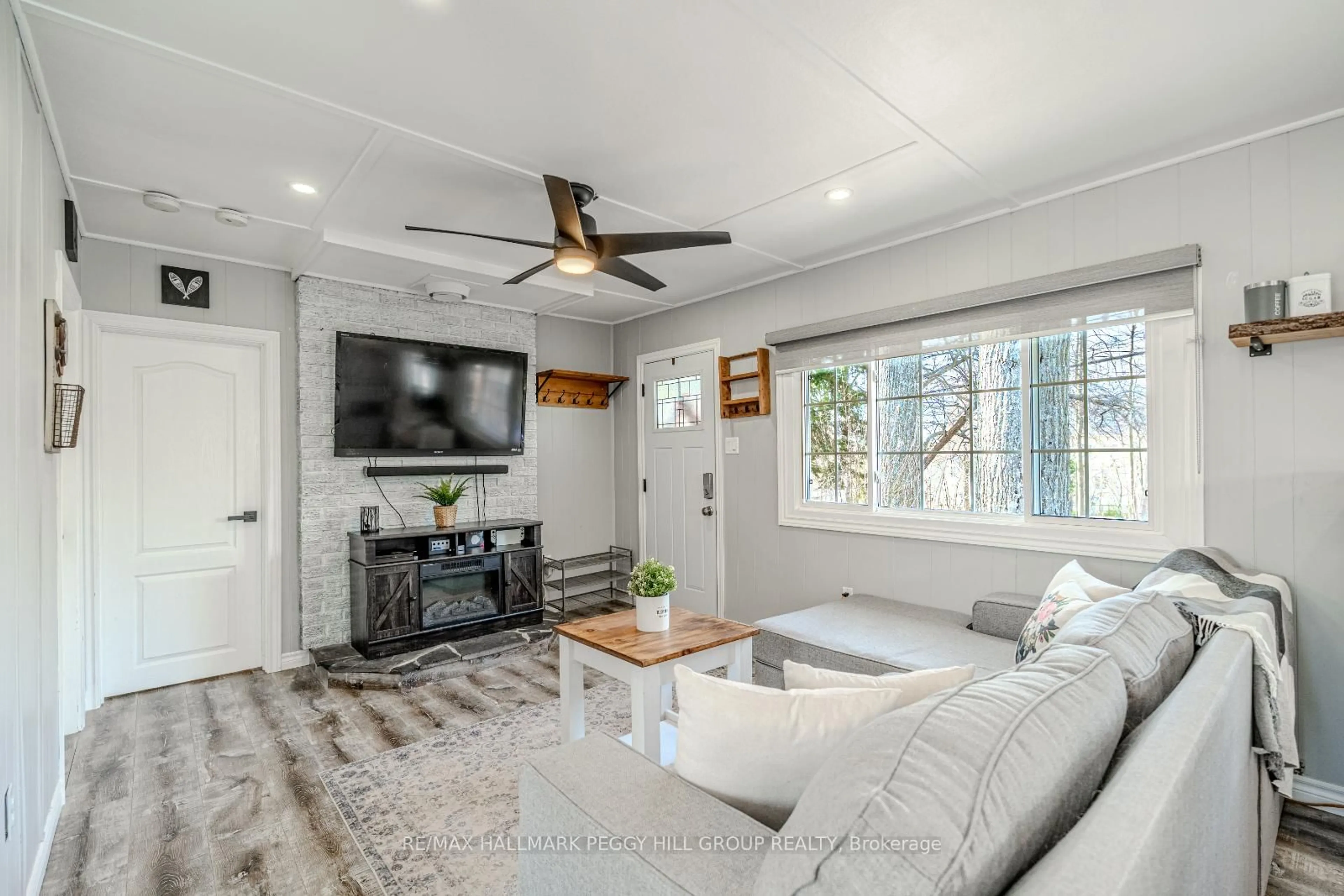 Living room with furniture, unknown for 1939 Tiny Beaches Rd, Tiny Ontario L0L 1P1