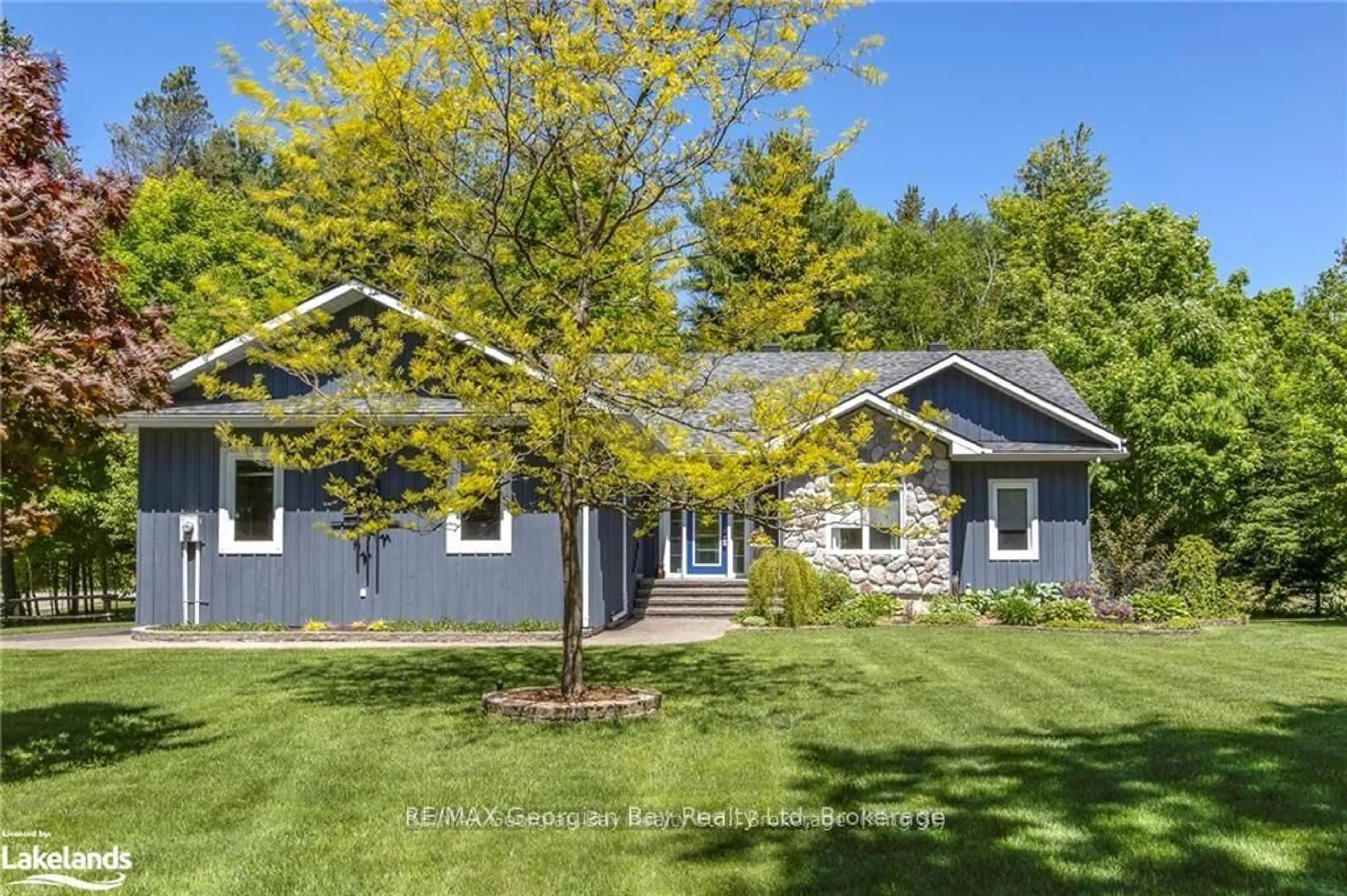 Home with vinyl exterior material, street for 65 Mourning Dove Tr, Tiny Ontario L0L 2J0