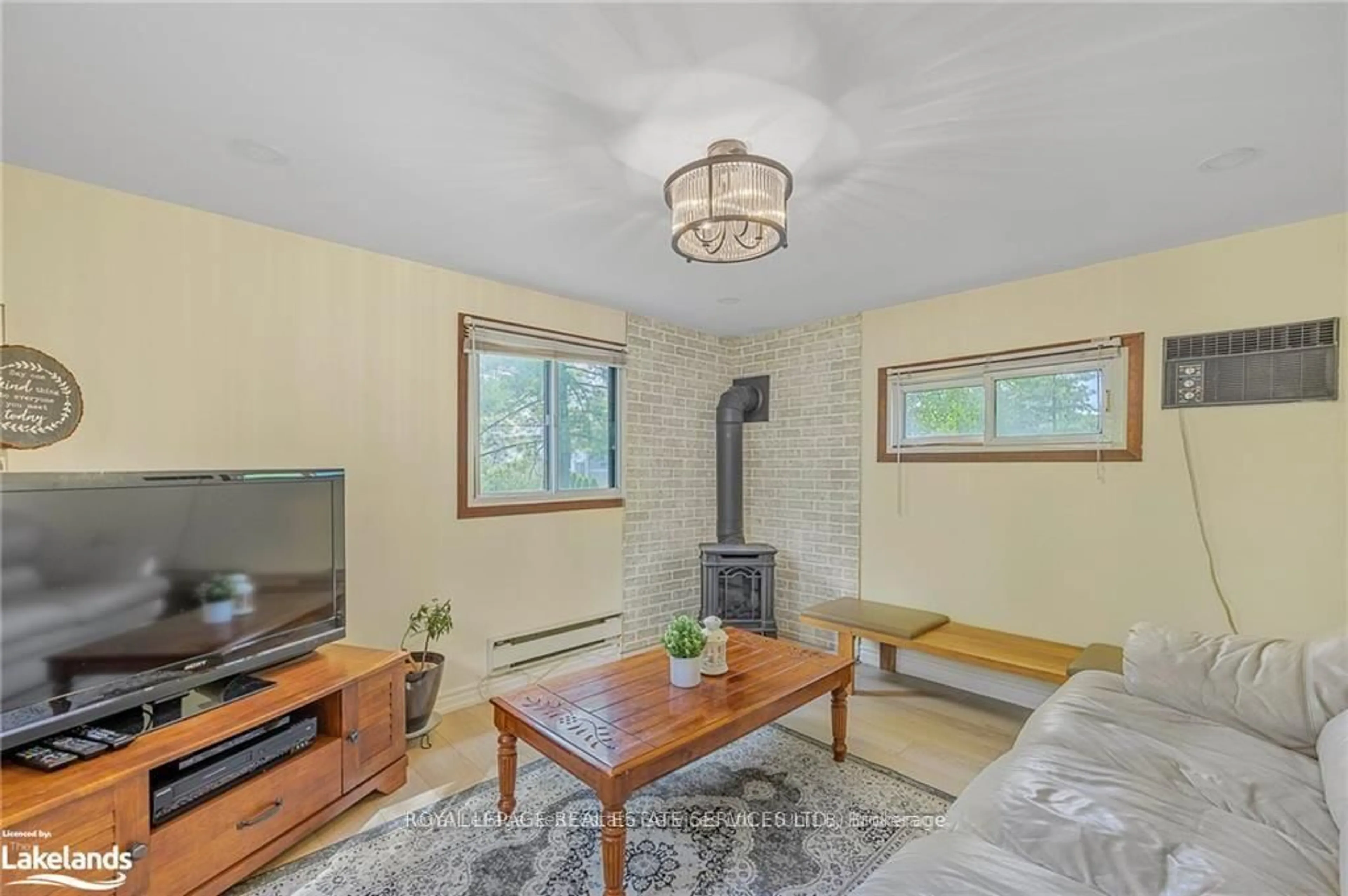 Living room with furniture, unknown for 34 Nancy St, Wasaga Beach Ontario L9Z 2K5