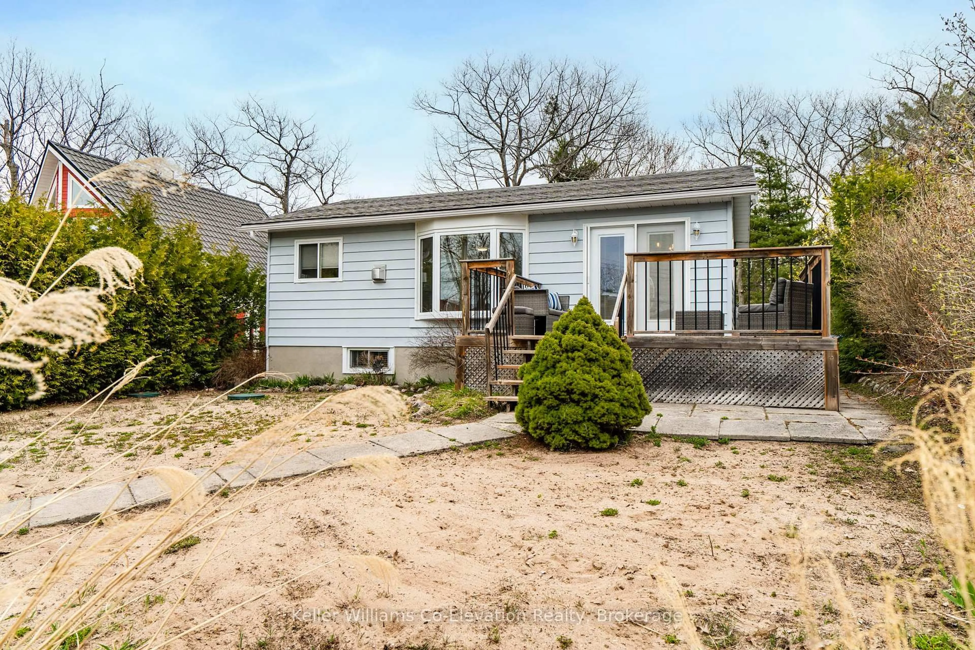 Home with vinyl exterior material, street for 13 Cobblestone Rd, Tiny Ontario L0L 2J0